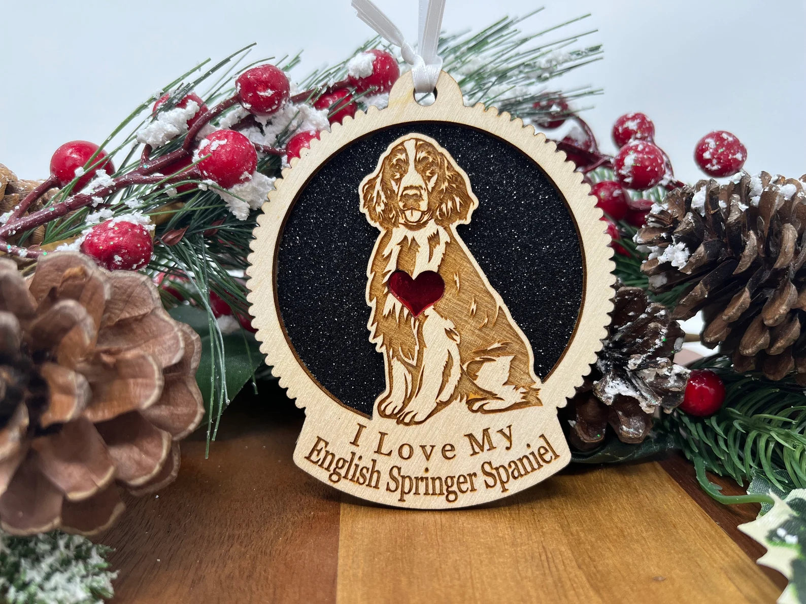 Laser cut wooden ornament featuring an English Springer Spaniel silhouette, perfect for Christmas decoration.