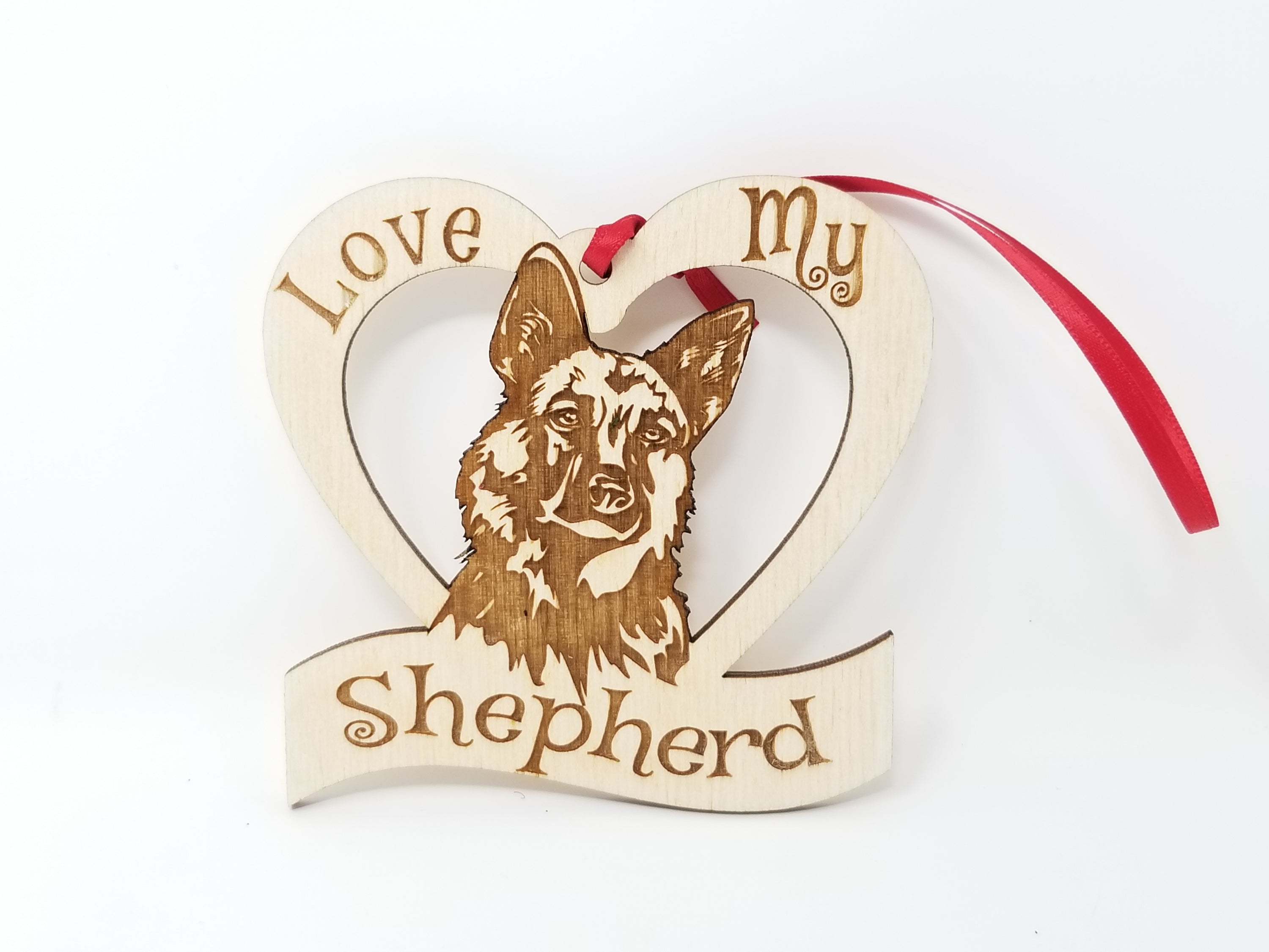 Laser engraved wooden ornament featuring a German Shepherd design, perfect for Christmas decoration.