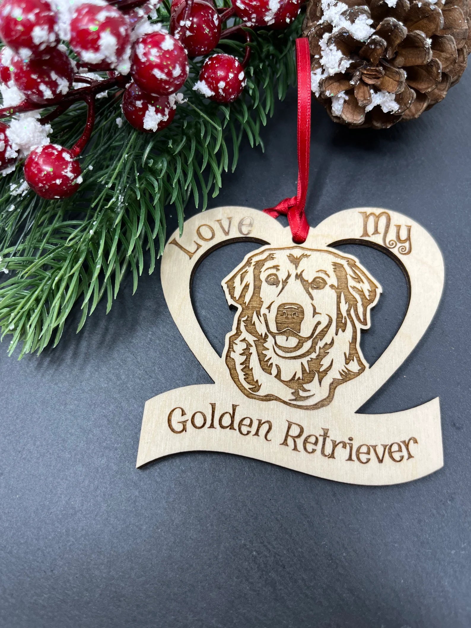 Laser engraved wooden ornament featuring a golden retriever, perfect for Christmas decor and gifts for dog lovers.