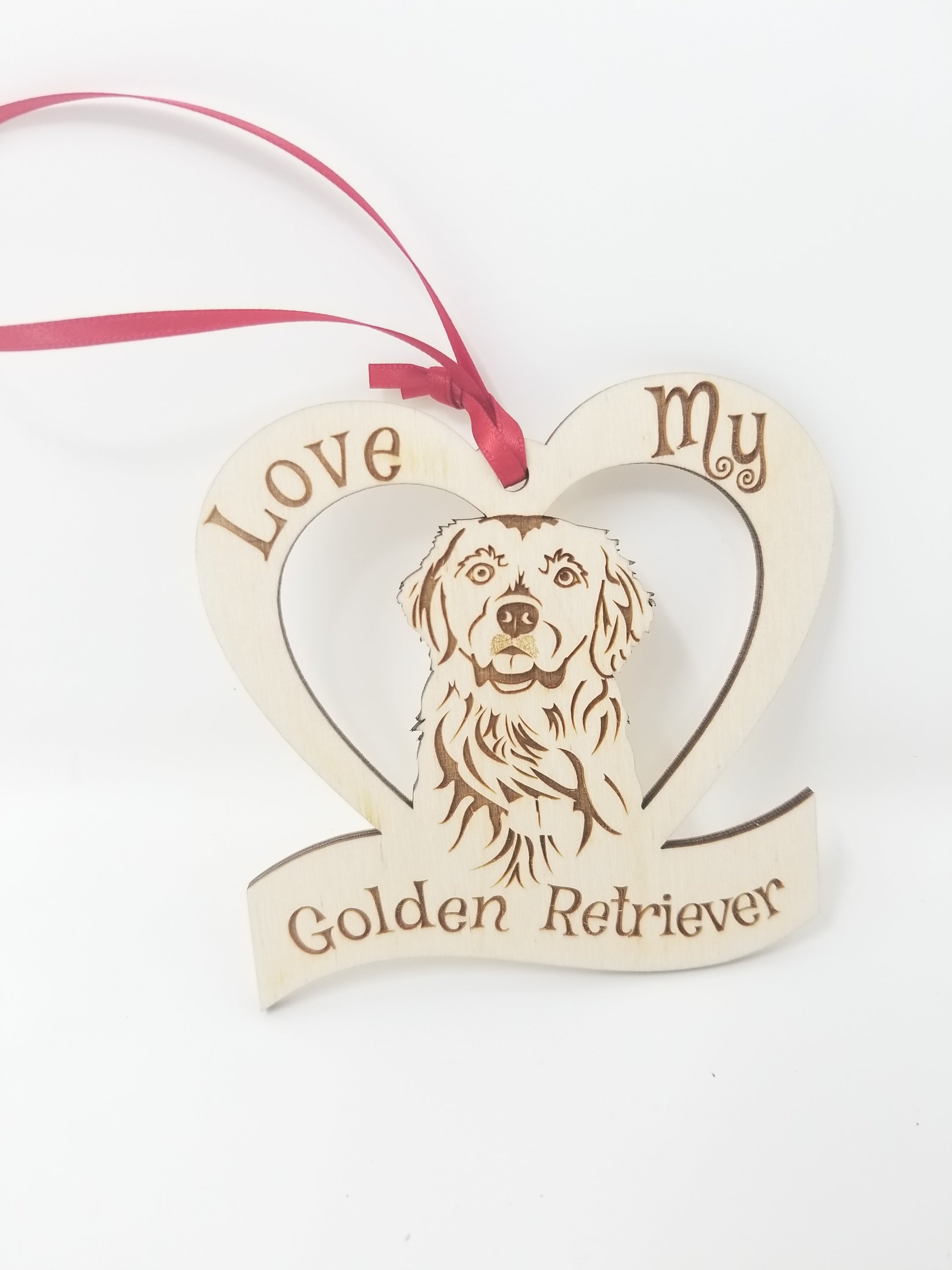 Laser engraved wooden ornament featuring a golden retriever, perfect for Christmas decor and gifts for dog lovers.