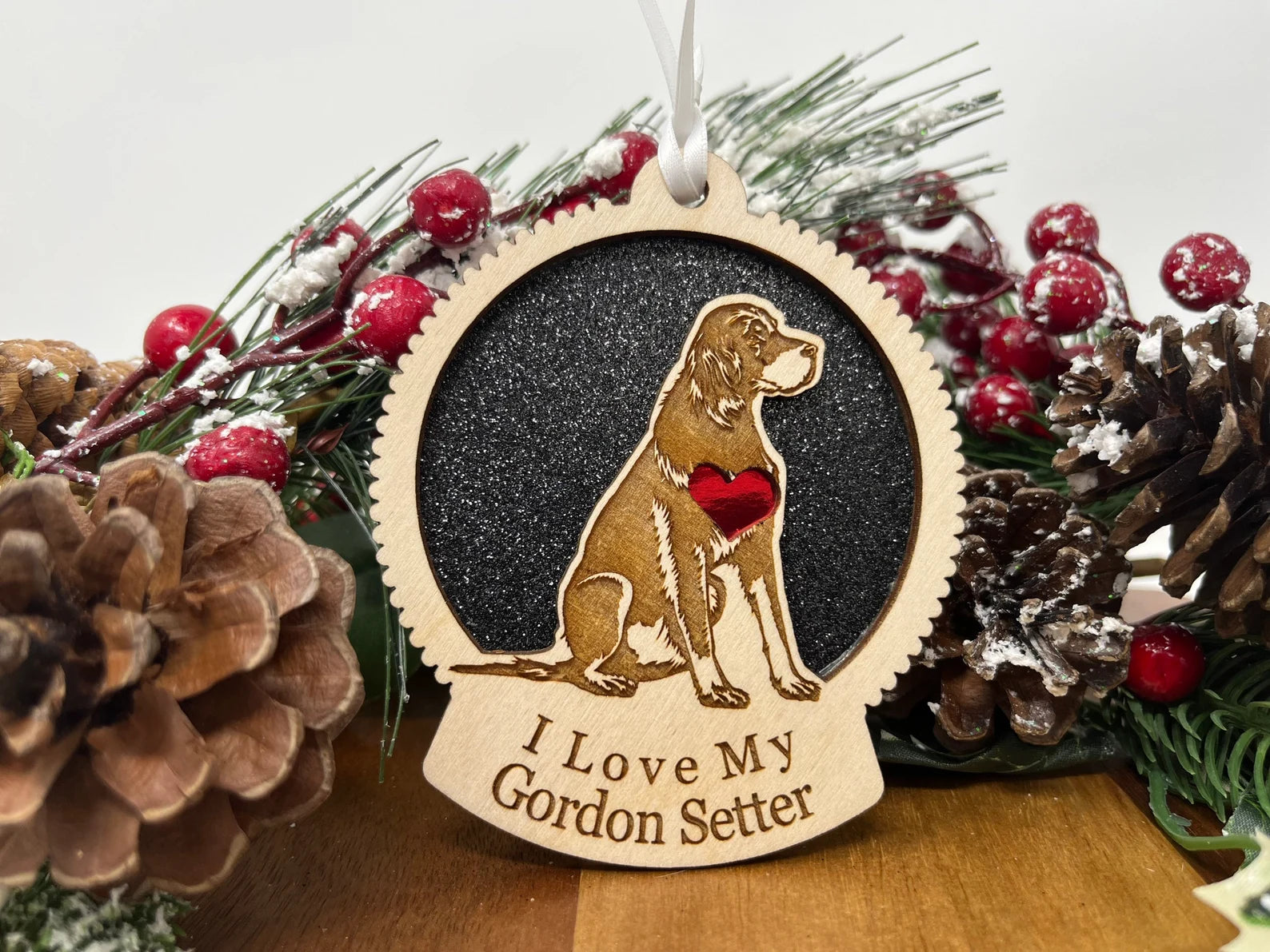 Beautiful laser-cut wooden ornament featuring a Gordon Setter silhouette, perfect for Christmas decoration.