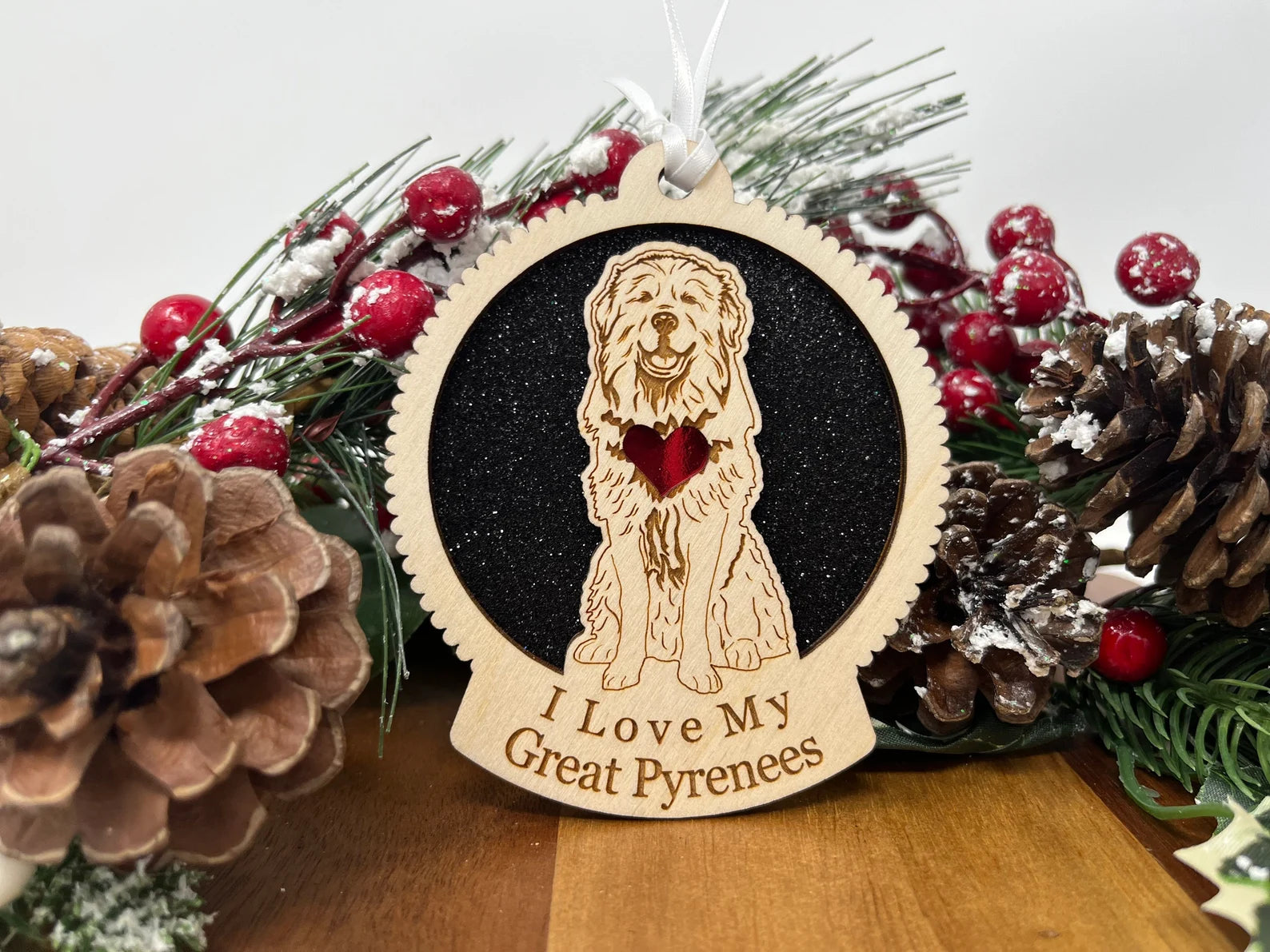 Laser cut wooden ornament featuring a Great Pyrenees silhouette, perfect for Christmas decoration.