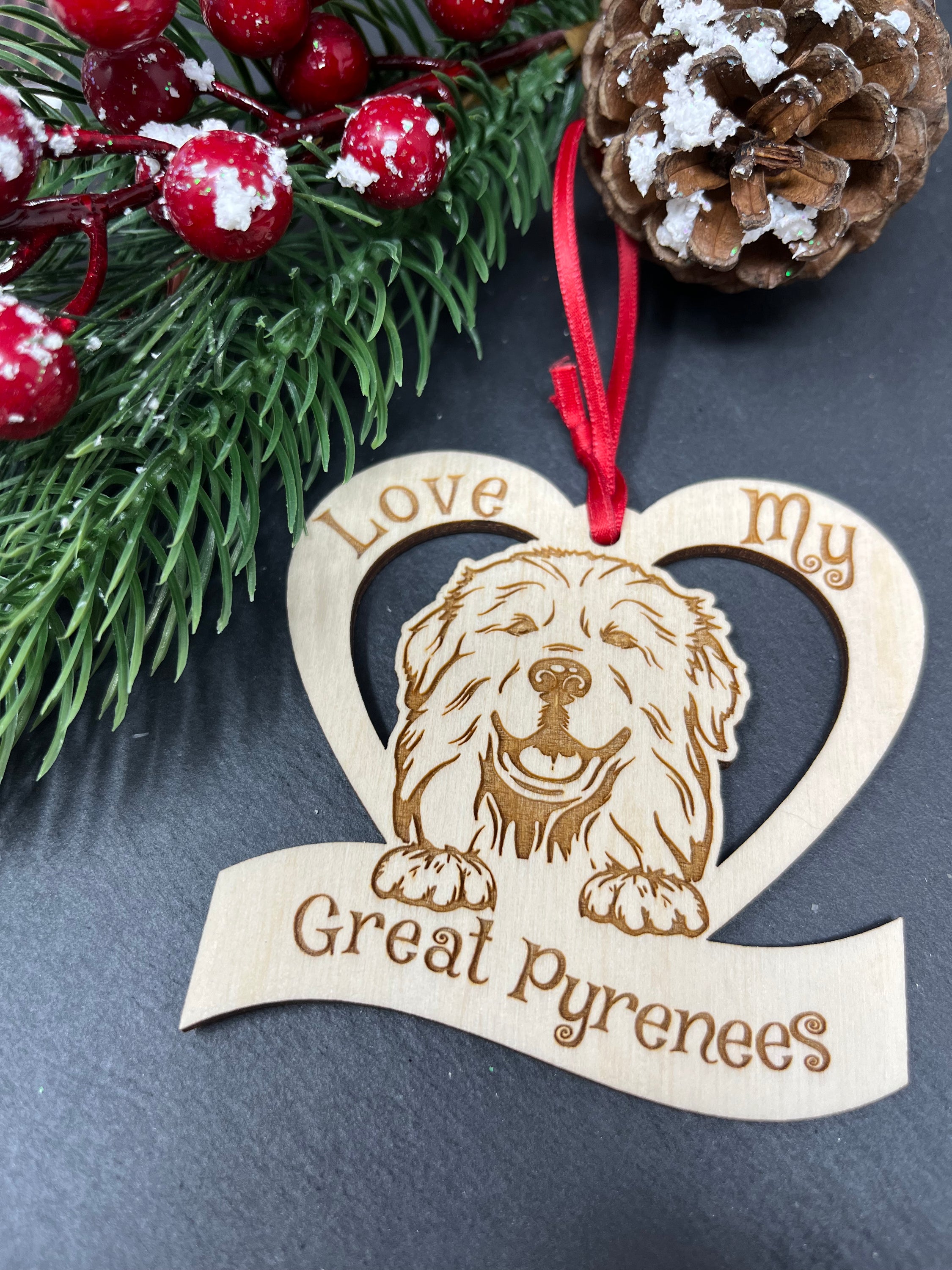 Laser engraved wooden ornament featuring a Great Pyrenees design, perfect for Christmas decoration.