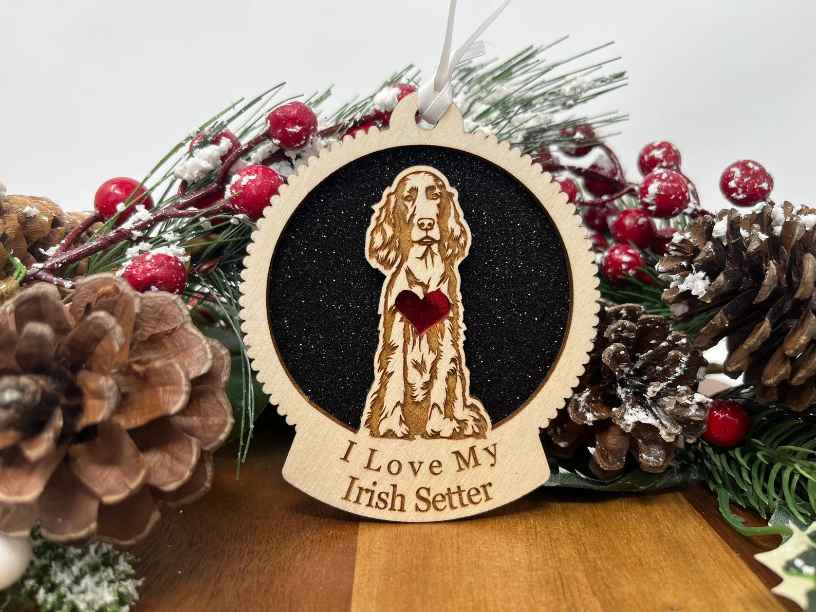 A beautifully crafted wooden ornament featuring a silhouette of an Irish Setter, perfect for Christmas decoration.