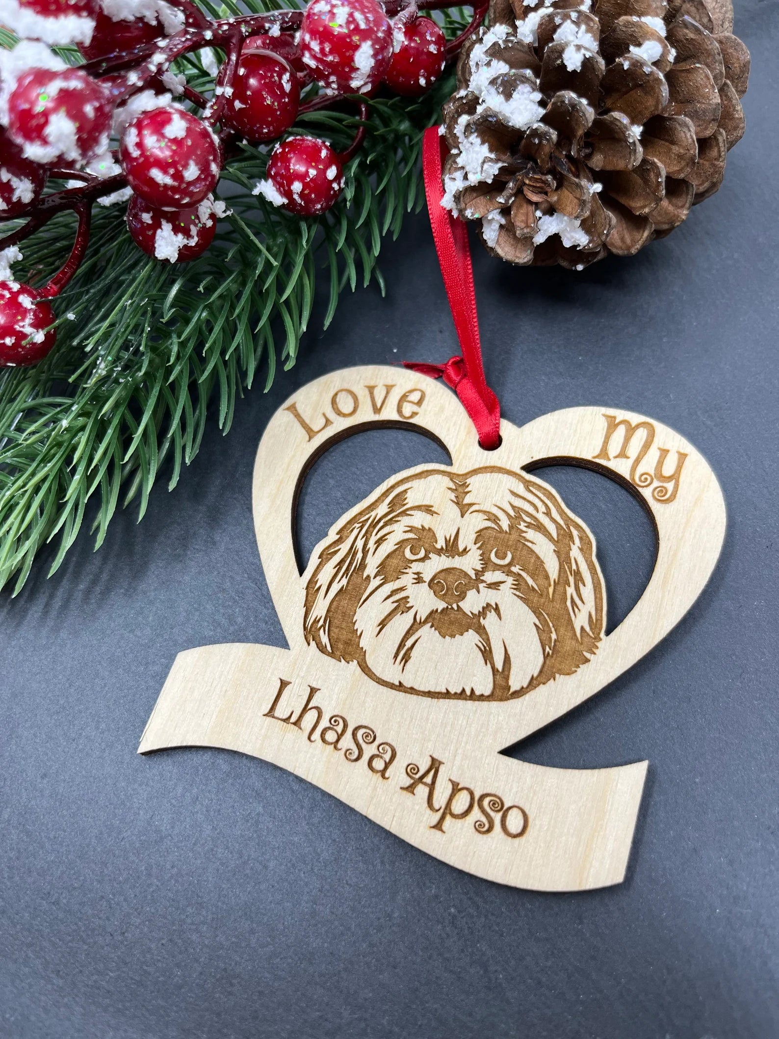 Laser engraved wooden ornament featuring a Lhasa Apso design, perfect for Christmas decoration.