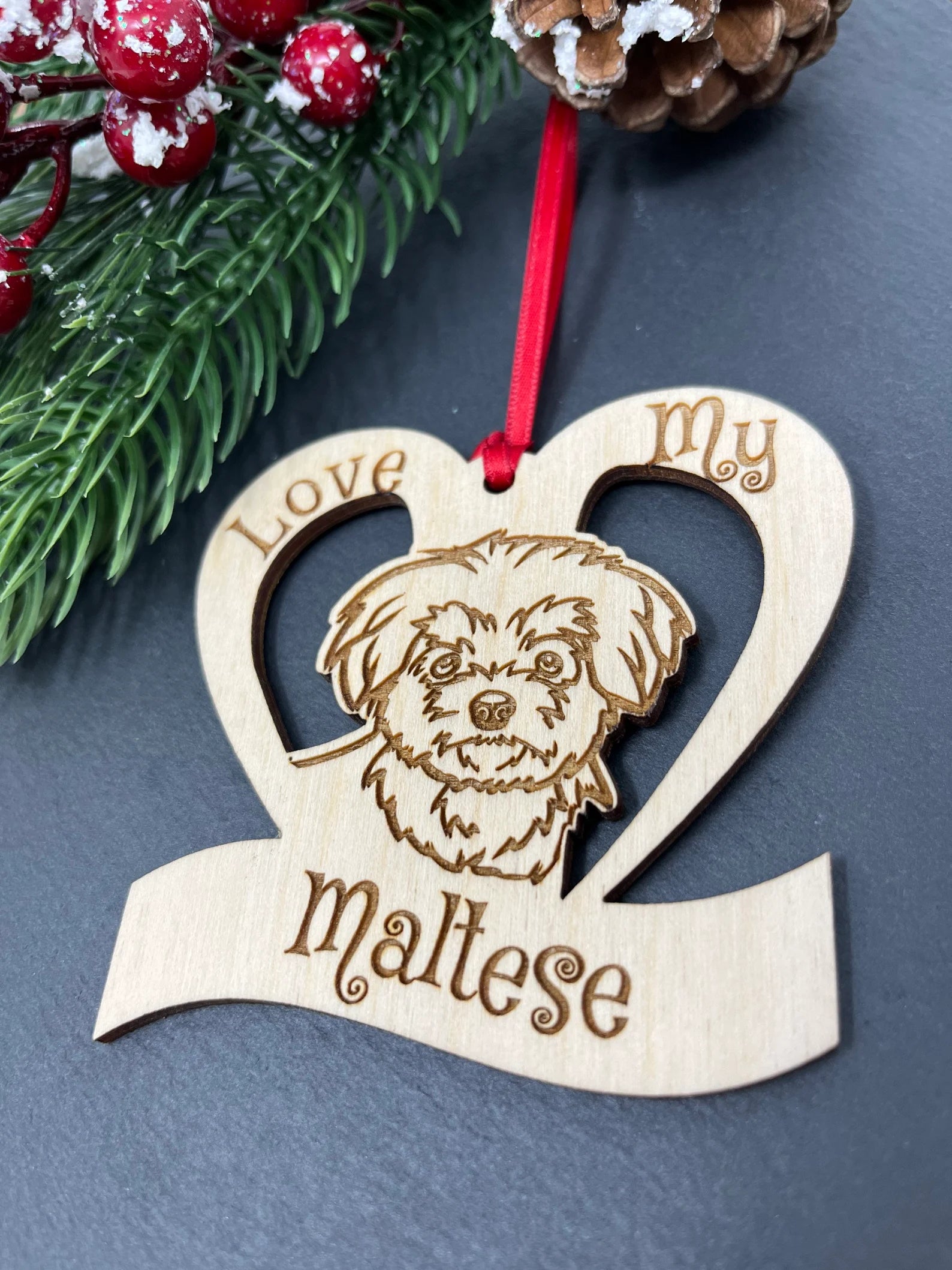 Laser engraved wooden ornament featuring a Maltese dog, perfect for Christmas decoration.