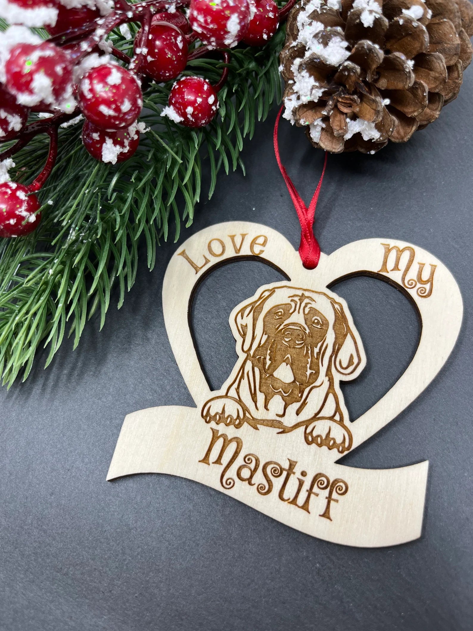 Laser engraved wooden ornament featuring a mastiff design, perfect for dog lovers.