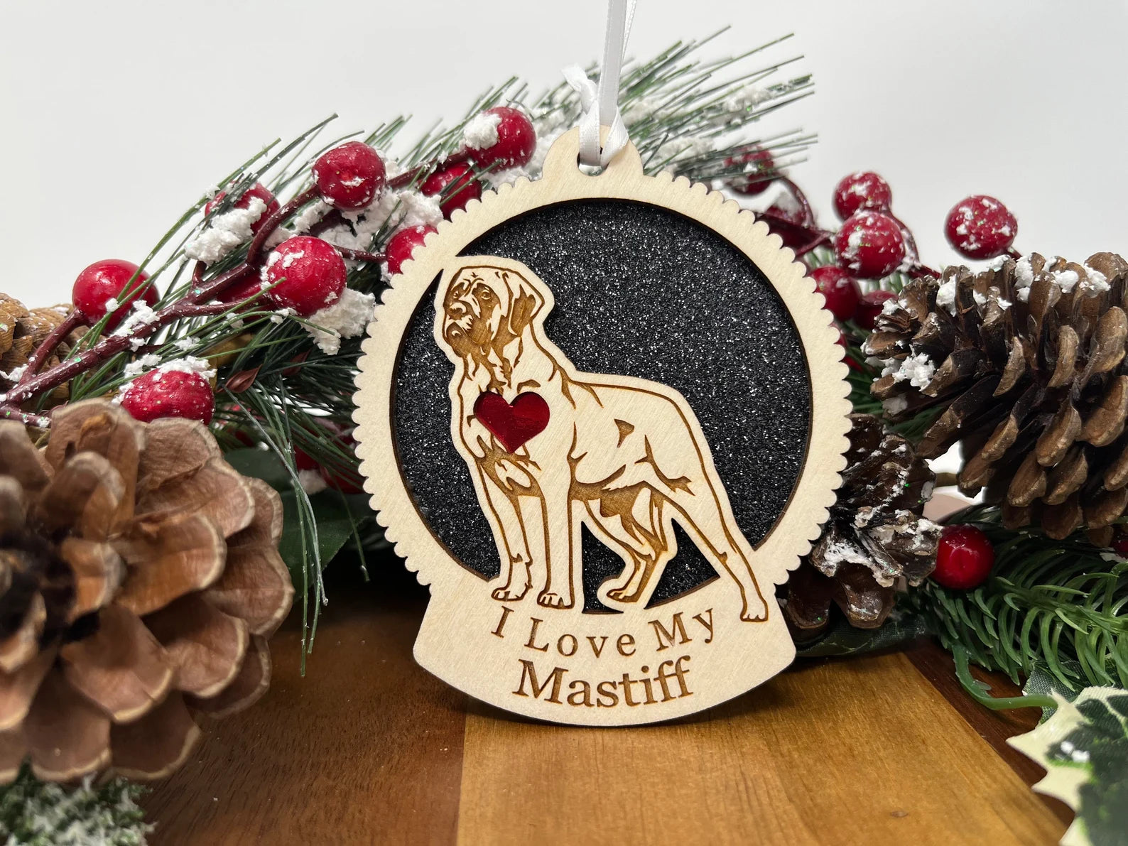 A beautifully crafted Love My Mastiff ornament made from laser-cut Baltic Birch wood, featuring a silhouette of a mastiff dog, perfect for Christmas decoration.