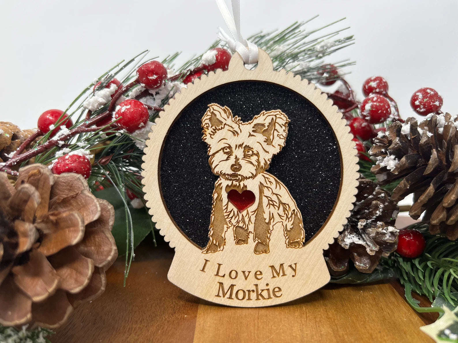 A beautifully crafted Love My Morkie wooden ornament featuring a laser-cut silhouette of a Morkie, perfect for Christmas decoration.