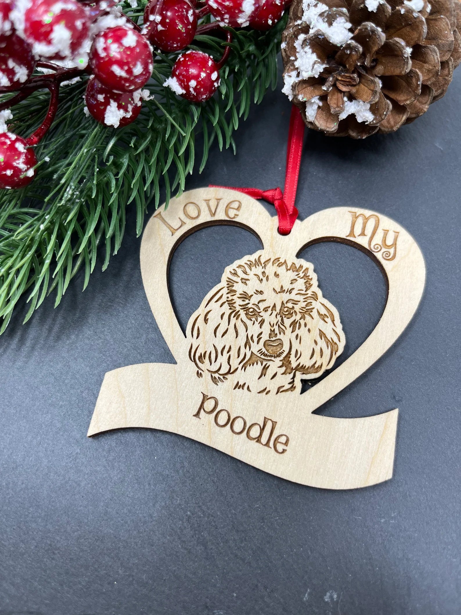 Love My Poodle ornament made of laser engraved Baltic Birch wood, featuring a unique design celebrating dogs, perfect for Christmas decoration.