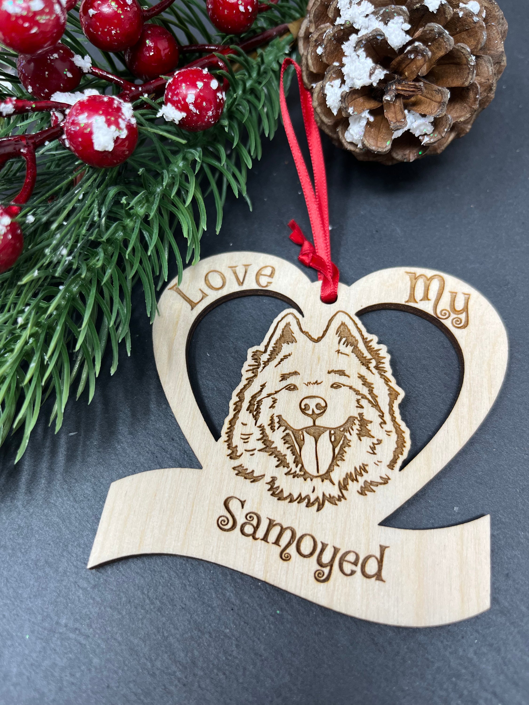 Love My Samoyed ornament made of laser engraved Baltic Birch wood, featuring a unique design celebrating the Samoyed breed.