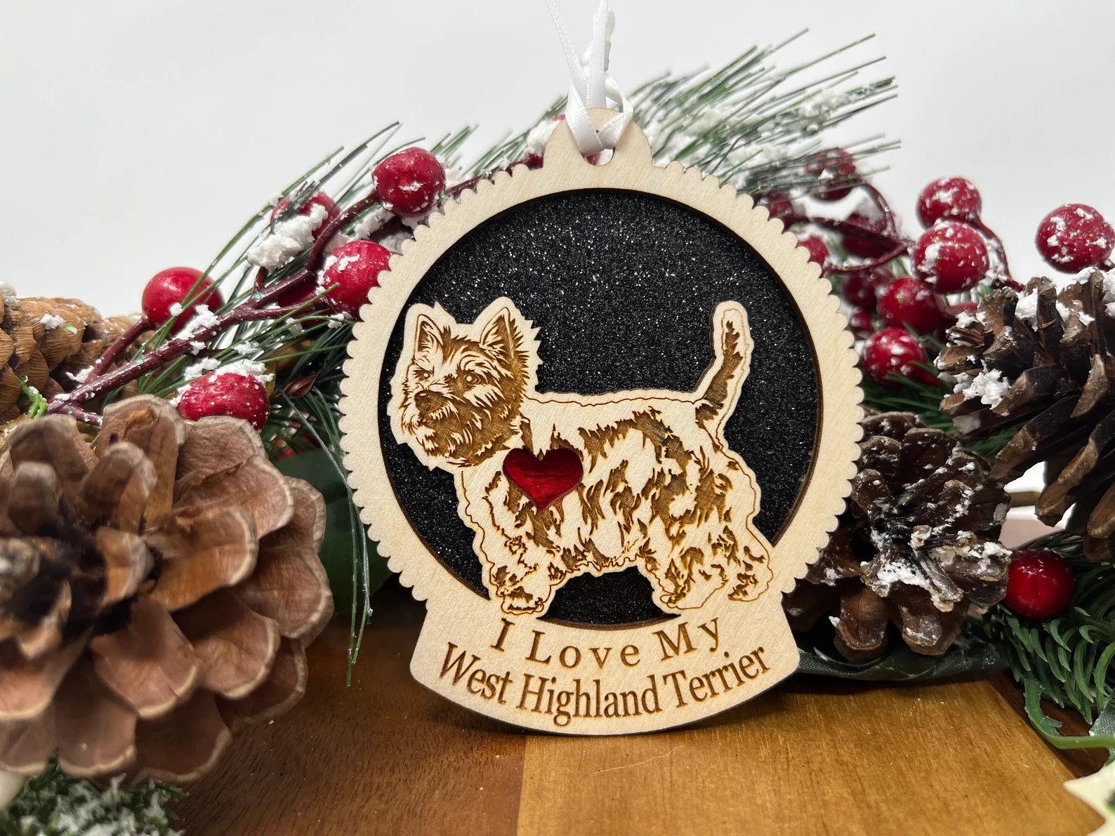 Laser cut wooden ornament featuring a West Highland Terrier silhouette, perfect for Christmas decoration.