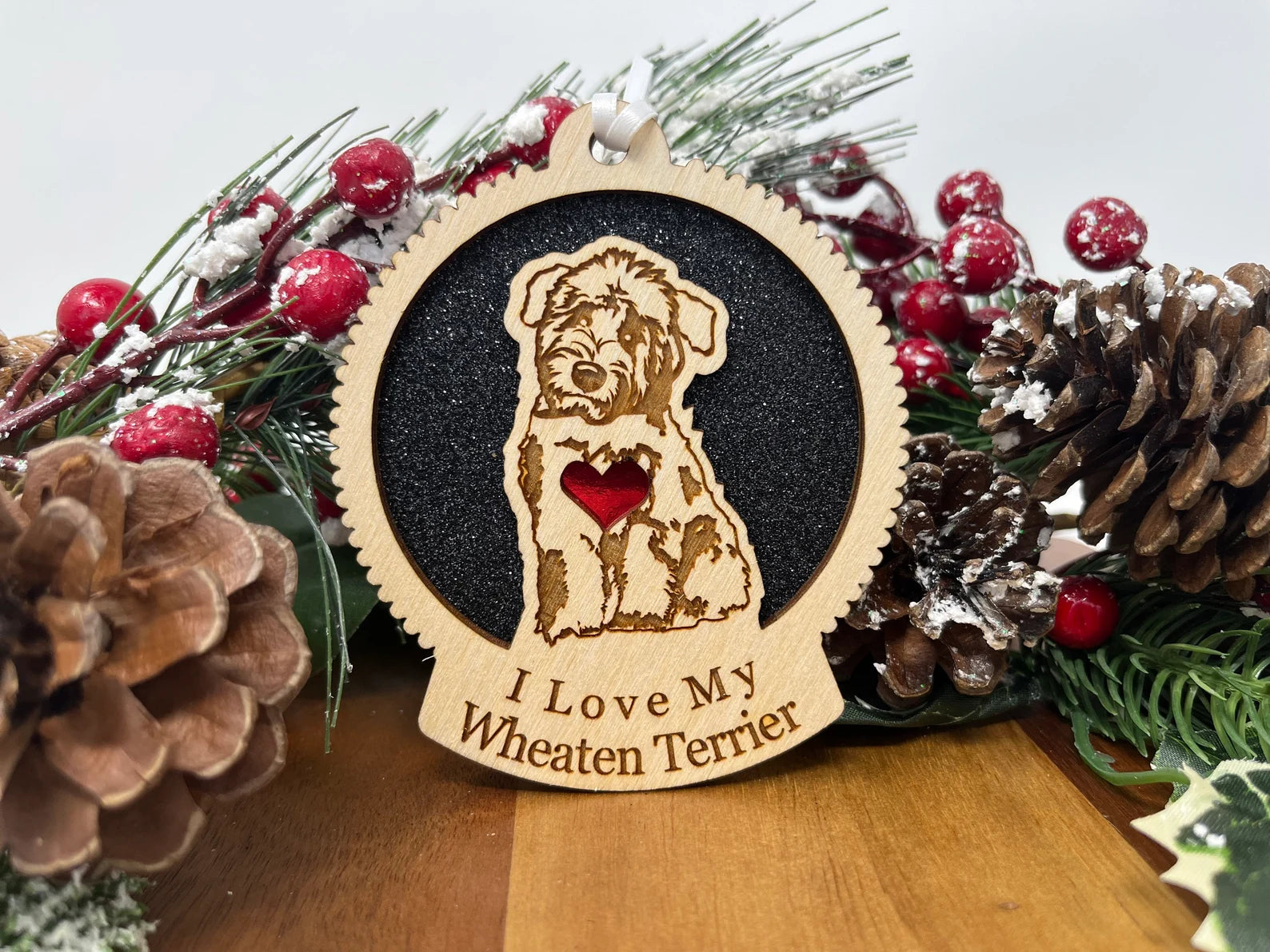 A beautifully crafted wooden ornament featuring a silhouette of a Wheaten Terrier, perfect for Christmas decorations.