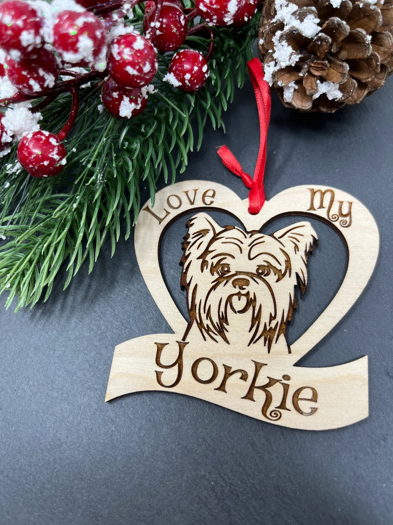 Love My Yorkie ornament made of laser engraved Baltic Birch wood, featuring a unique design celebrating Yorkies, ready to hang with a ribbon.