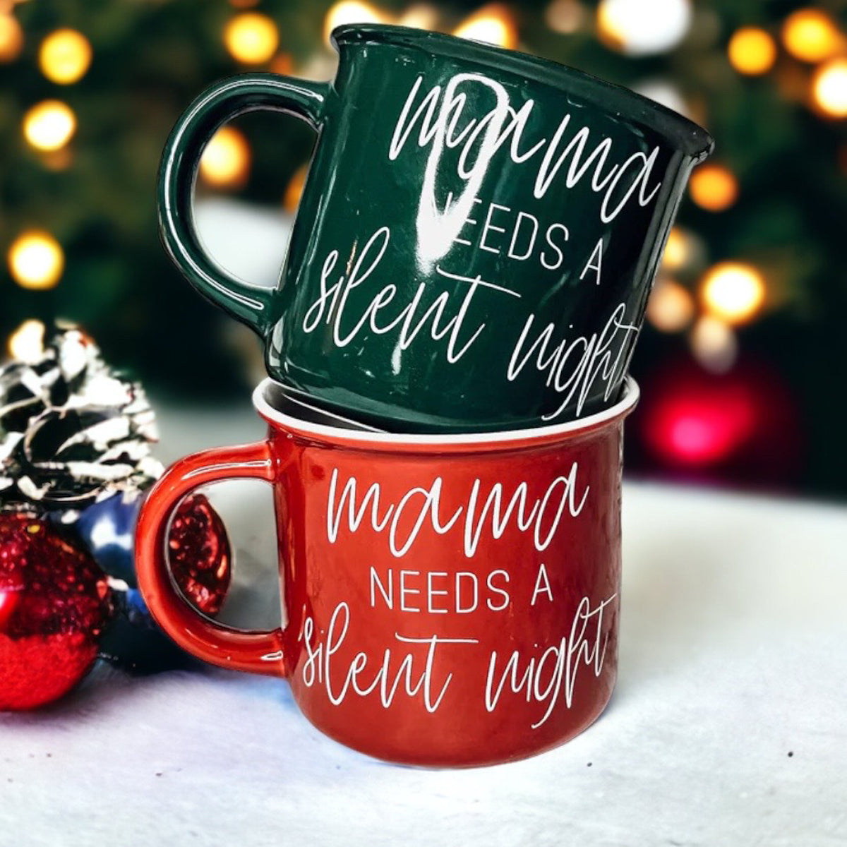 Mama Needs a Silent Mug in red and green ceramic with white lettering, showcasing a humorous design for parents.