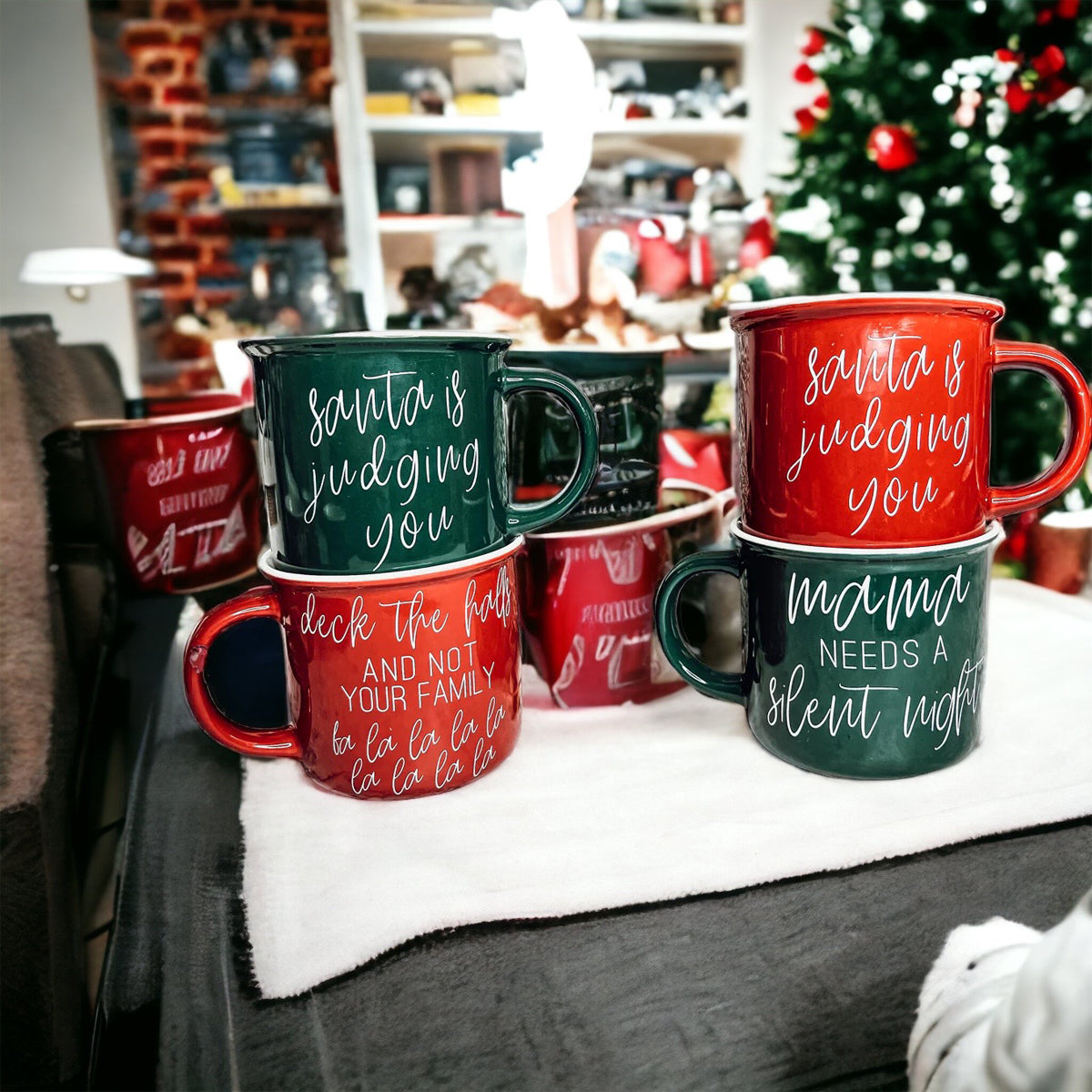 Mama Needs a Silent Mug in red and green ceramic with white lettering, showcasing a humorous design for parents.