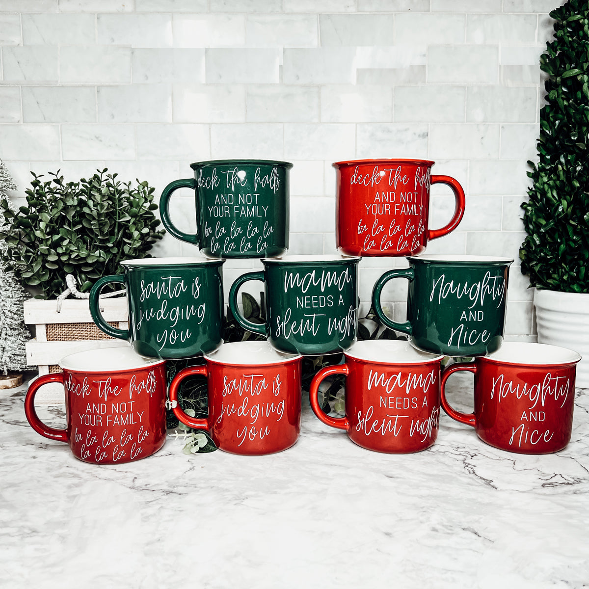 Mama Needs a Silent Mug in red and green ceramic with white lettering, showcasing a humorous design for parents.