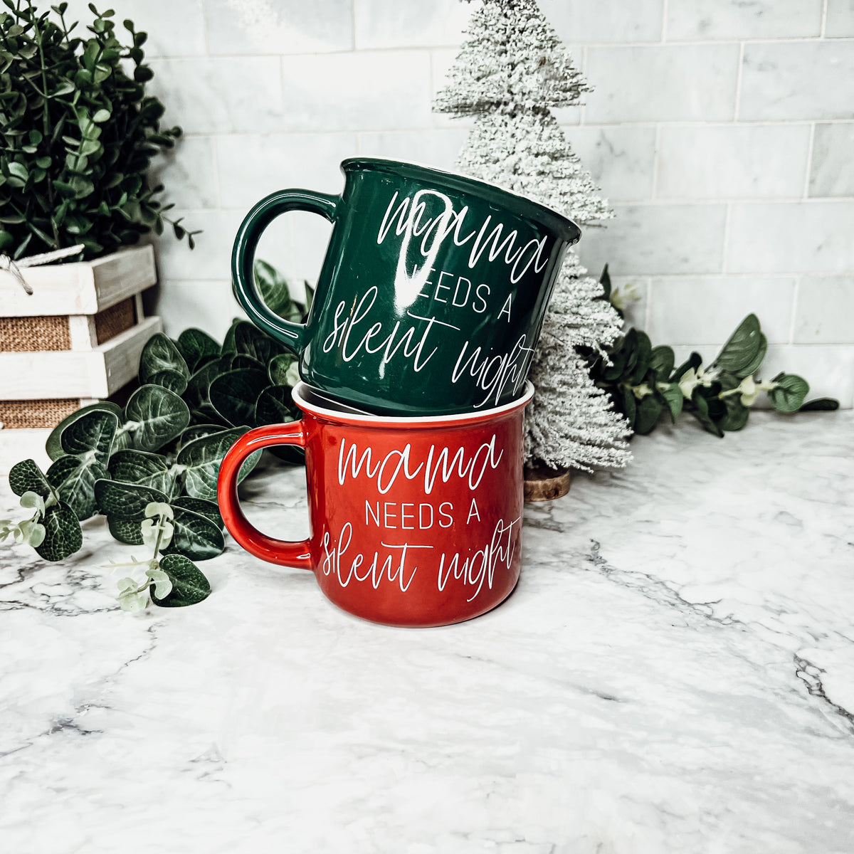 Mama Needs a Silent Mug in red and green ceramic with white lettering, showcasing a humorous design for parents.