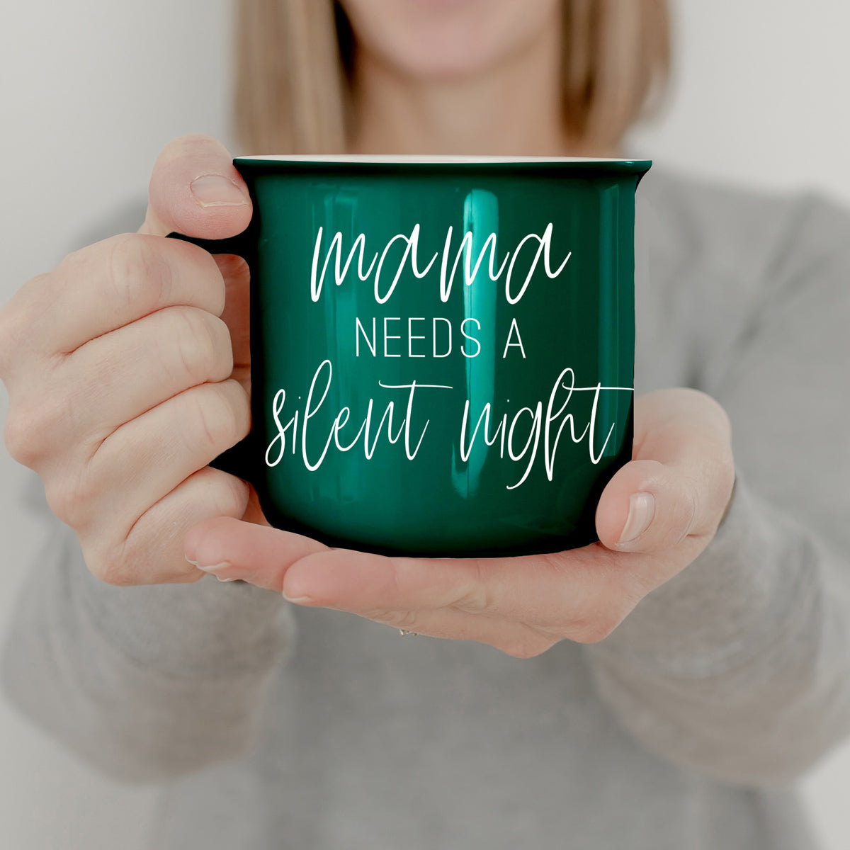 Mama Needs a Silent Mug in red and green ceramic with white lettering, showcasing a humorous design for parents.