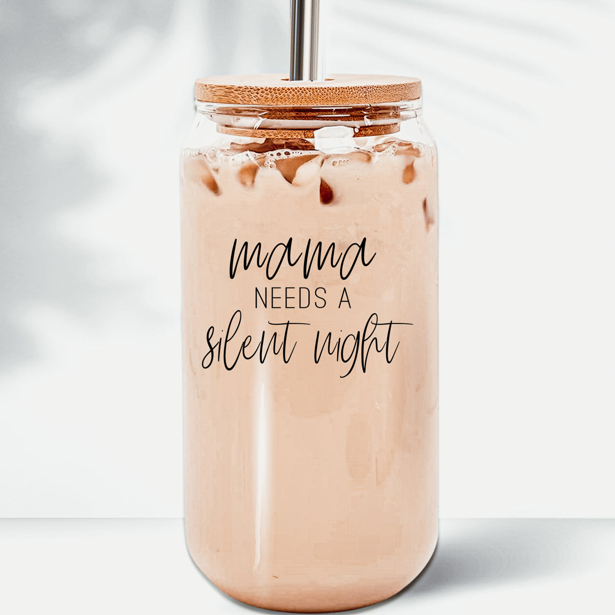 Mama - Silent Night glass drinking cup with bamboo lid and stainless steel straws, showcasing a sleek design and black graphic.