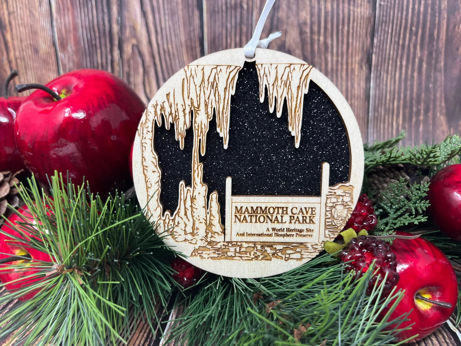 Mammoth Cave Ornament made from premium Baltic birch wood, showcasing a city skyline design.