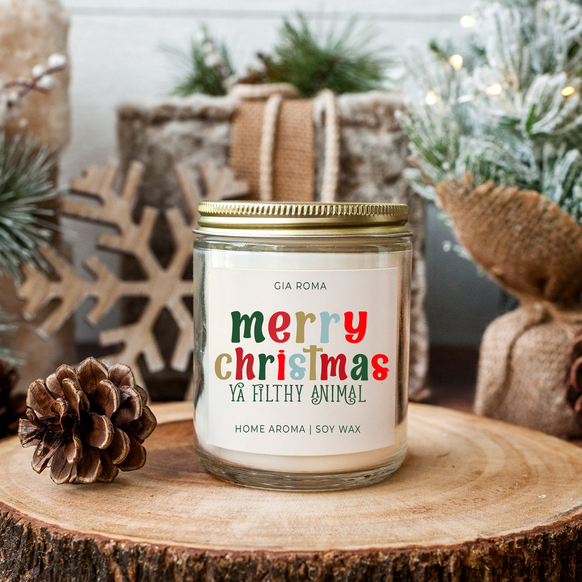 A beautifully designed Merry Christmas Candle in a 9oz jar, featuring a festive label and a warm glow, perfect for holiday decor.