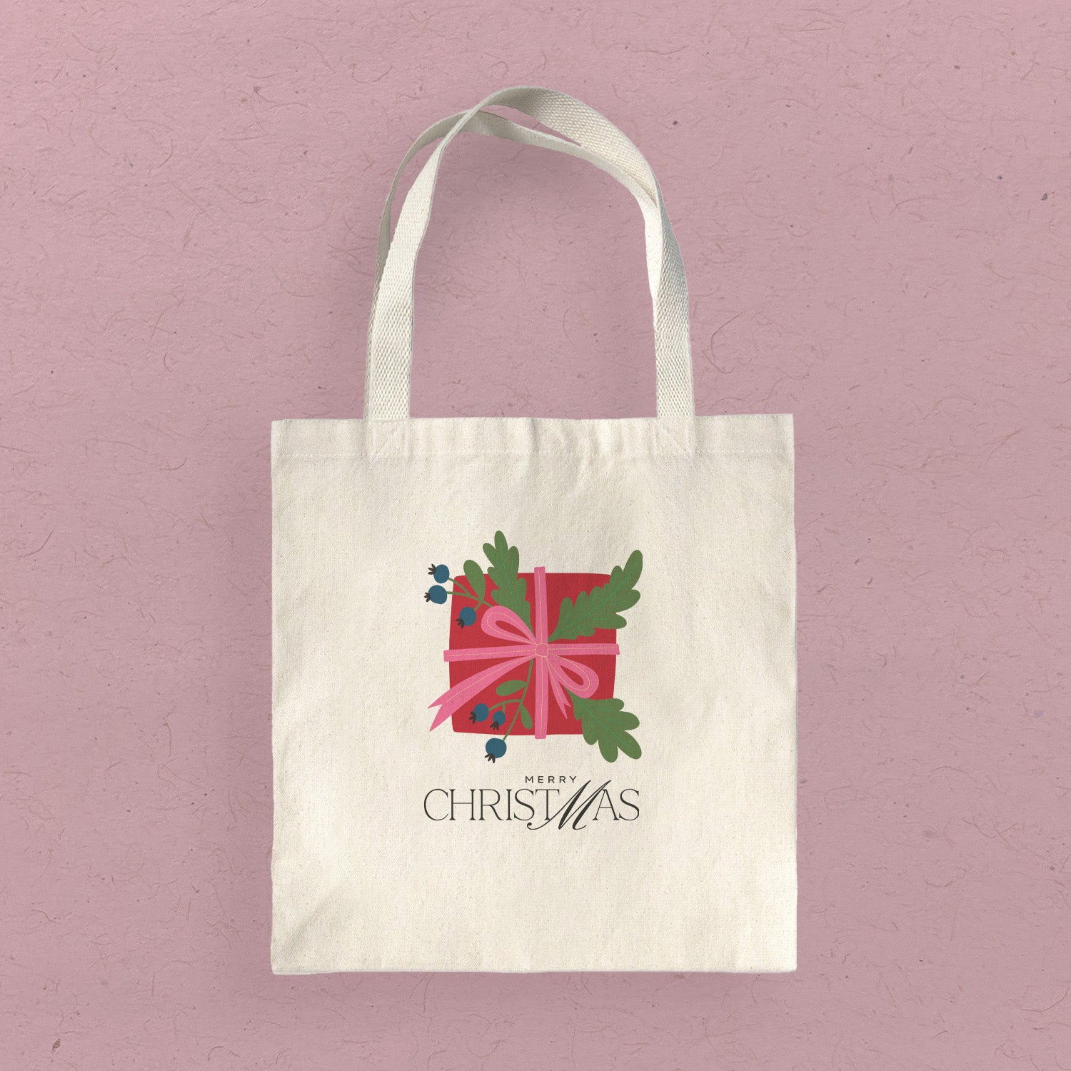 Merry Christmas Canvas Tote Bag featuring vibrant holiday design on heavy-duty fabric with reinforced straps.