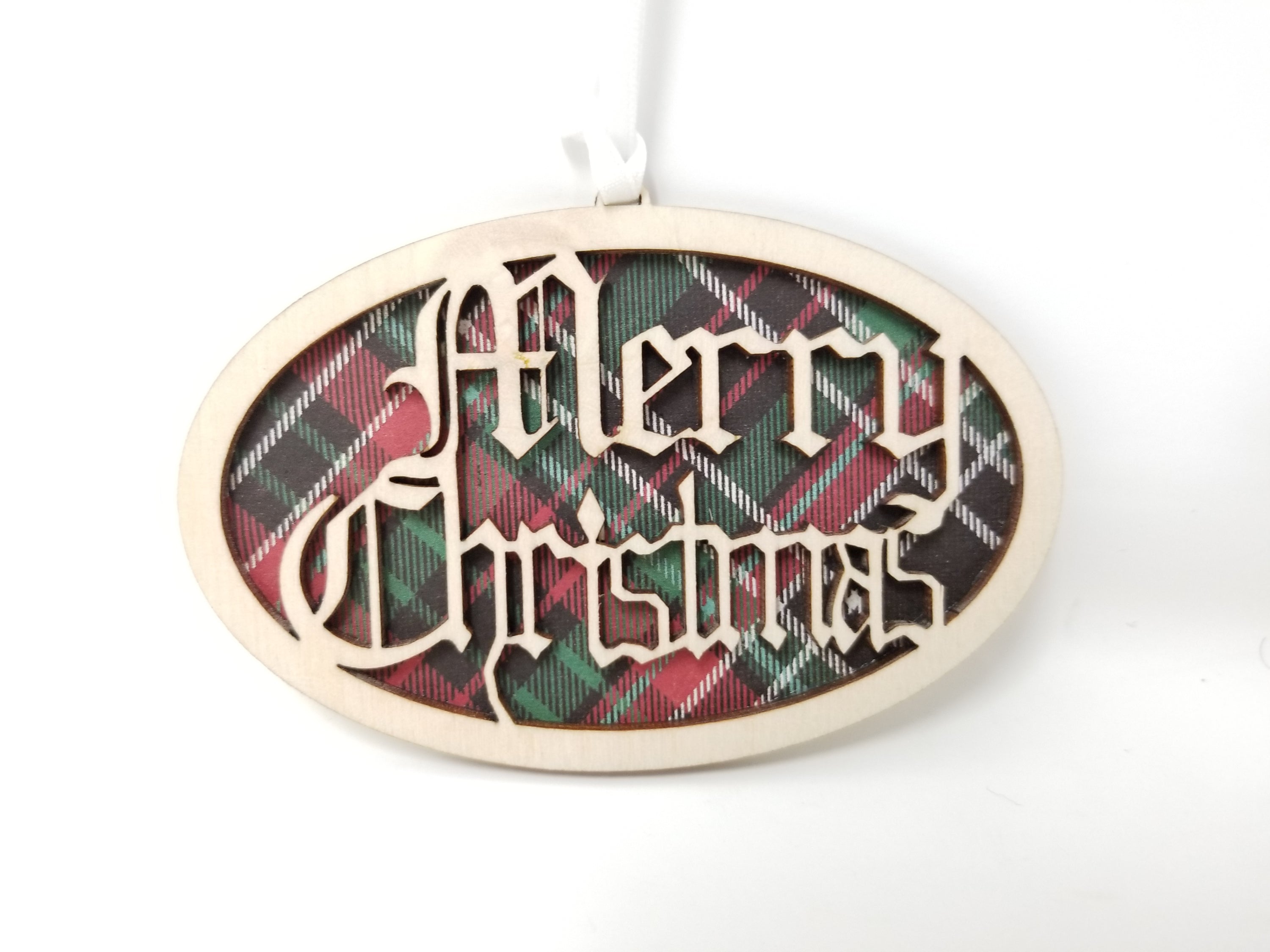 Merry Christmas Plaid Ornament made from premium Baltic Birch wood, featuring intricate laser-cut designs.