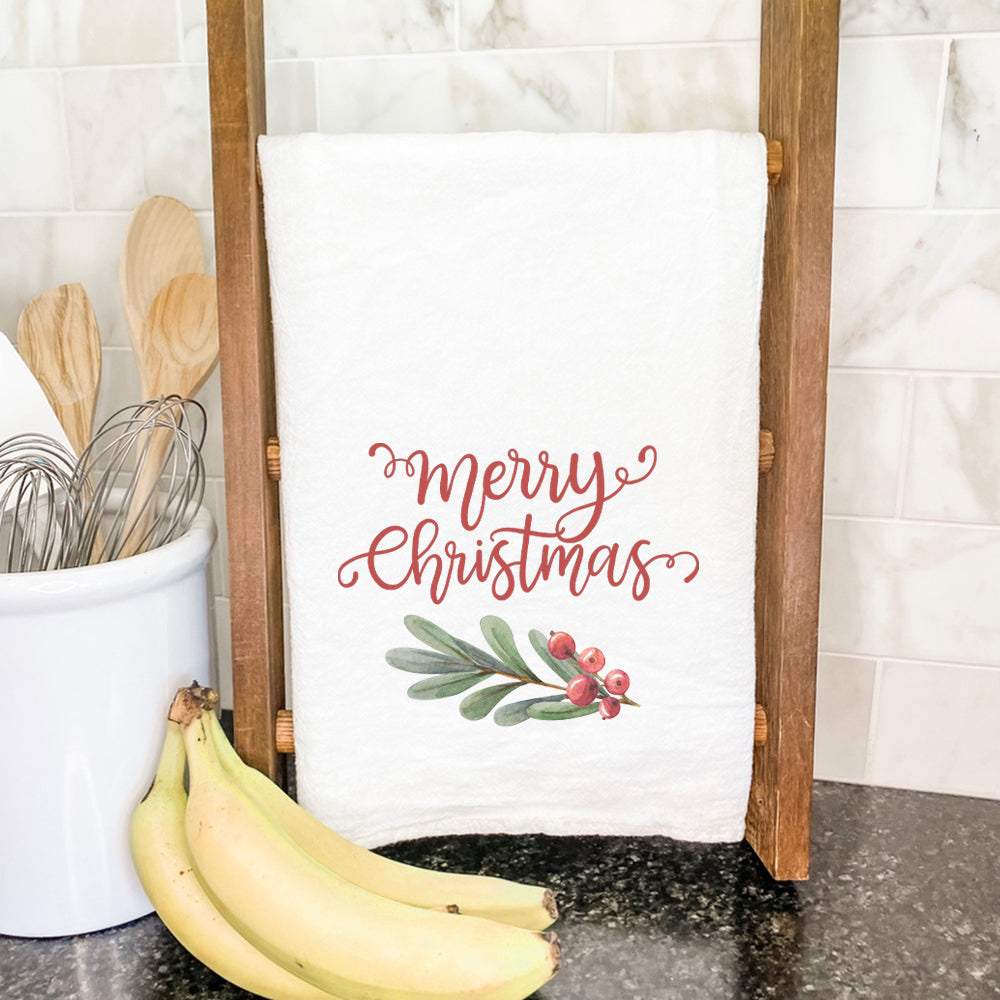 Merry Christmas Sprig cotton tea towel featuring a vibrant holiday design with hemmed edges, perfect for kitchen use.