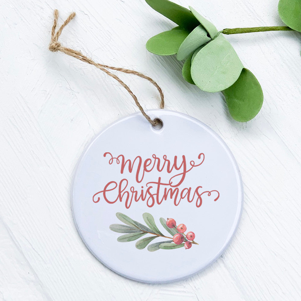 Merry Christmas Sprig ornament made of high-quality porcelain, featuring a vibrant design with a smooth, glossy finish, measuring 2.75 inches in diameter.