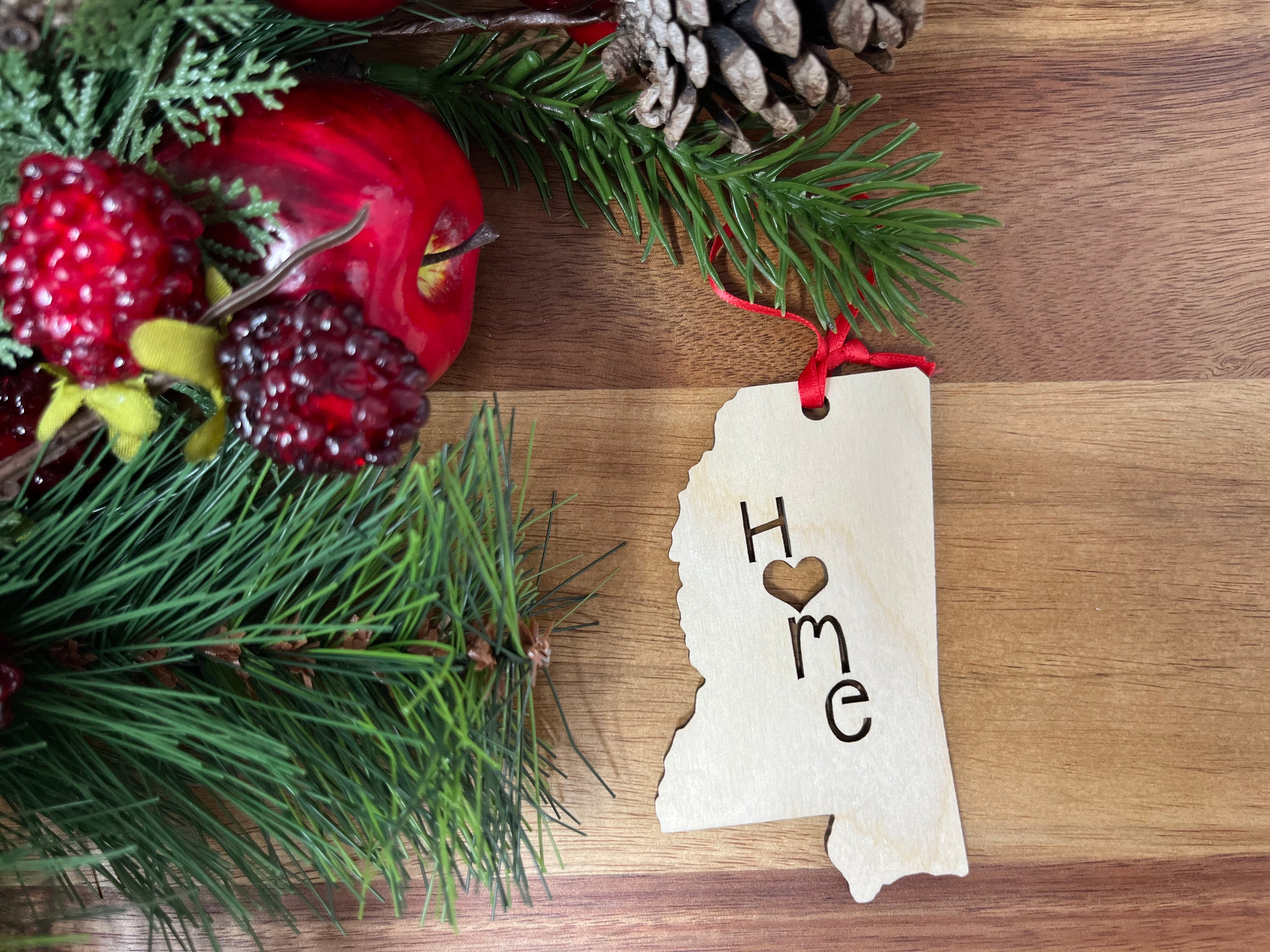 Mississippi State Wood Christmas Ornament made from Baltic Birch, featuring the word 'Home' in a charming design.