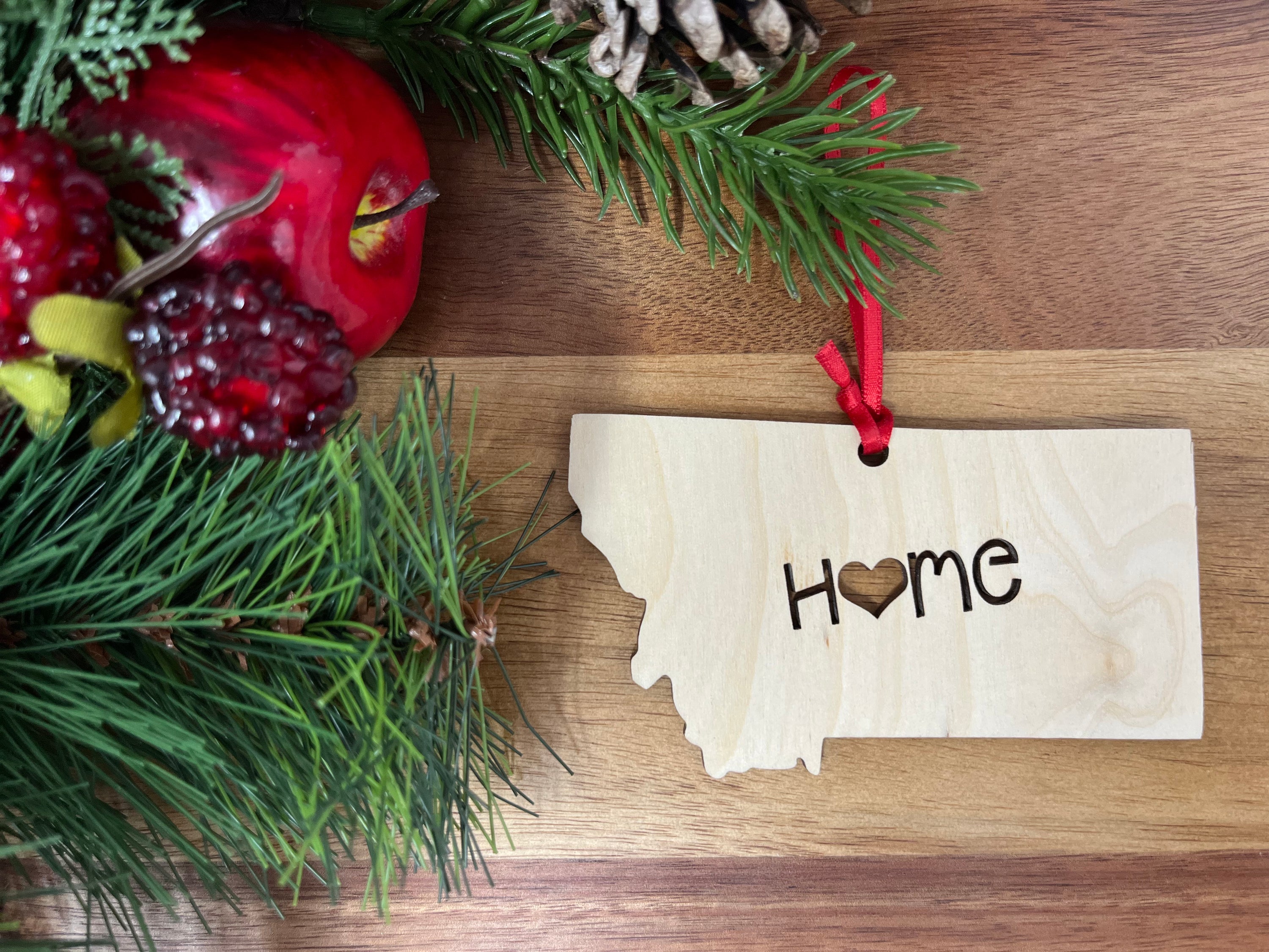 Montana State Wood Christmas Ornament featuring the word 'Home' crafted from premium Baltic Birch wood.