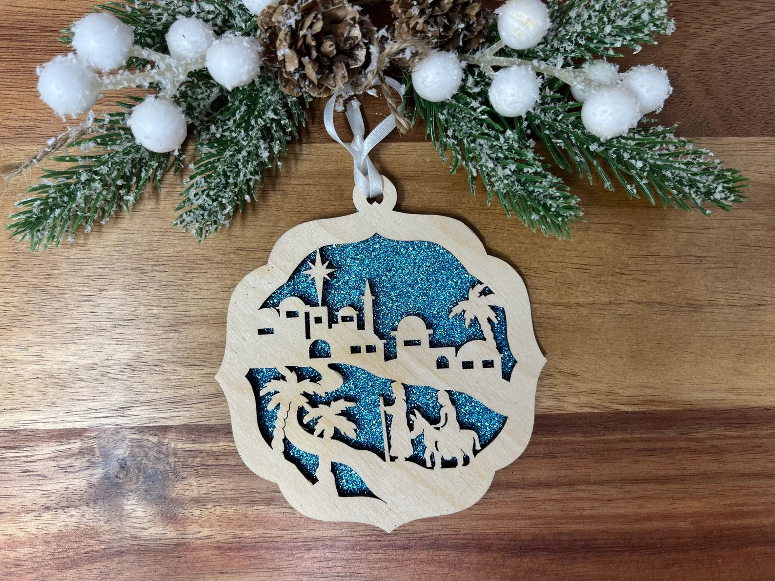 Nativity on the Hill ornament made from premium Baltic Birch wood, featuring intricate laser-cut details.