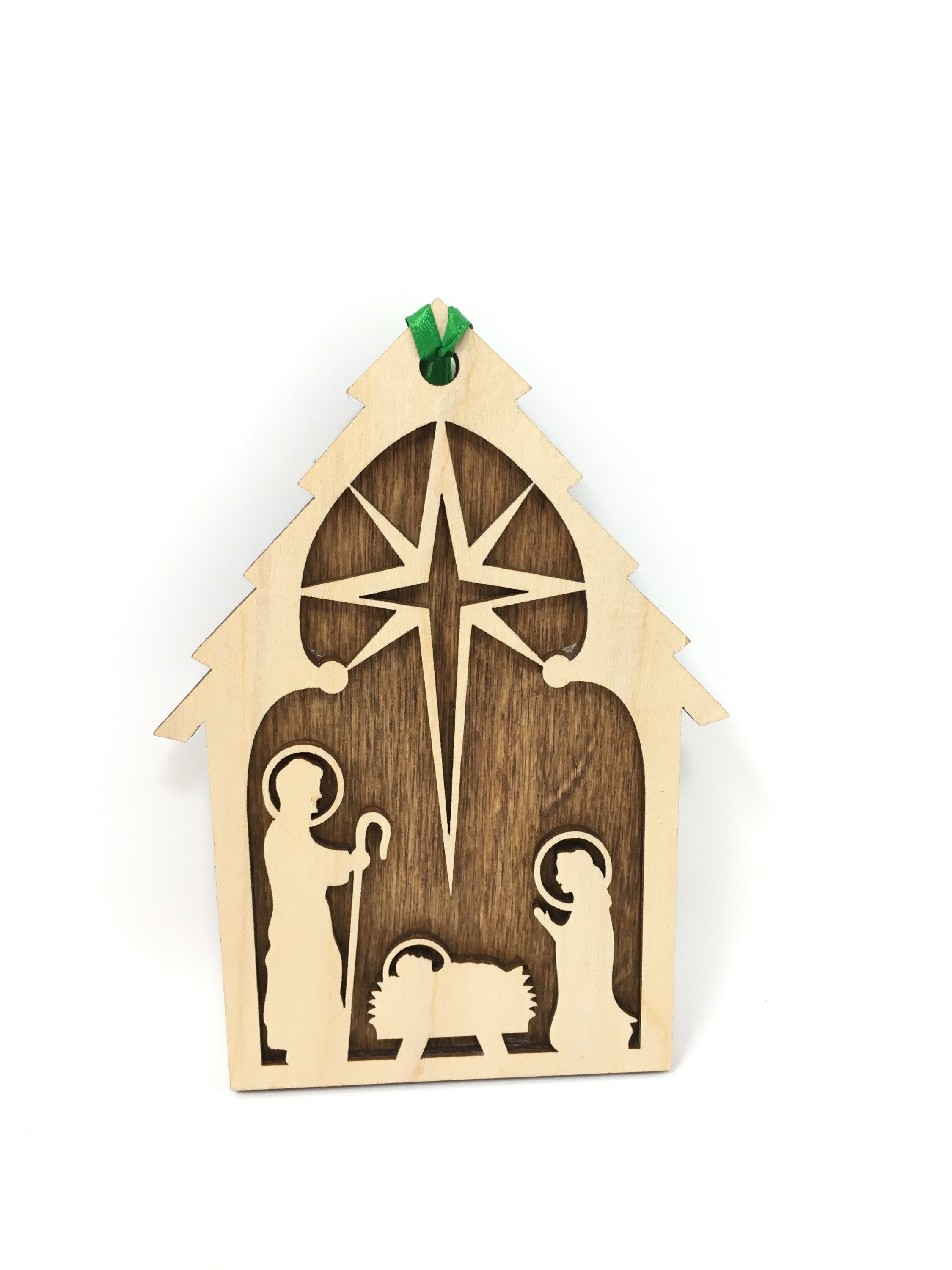 Nativity ornament made of premium Baltic Birch wood, featuring intricate laser-cut details and a wood backing, elegantly packaged in a cotton-filled jewelry box.