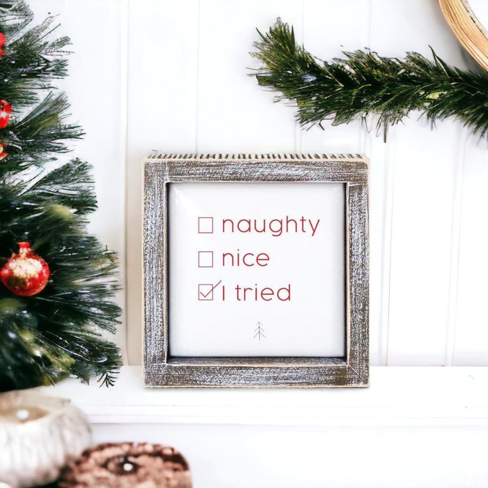 Naughty Nice 5" Sign with embossed lettering in festive colors, framed in wood, perfect for Christmas decor.