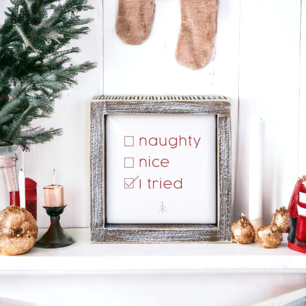 Naughty Nice 5" Sign with embossed lettering in festive colors, framed in wood, perfect for Christmas decor.