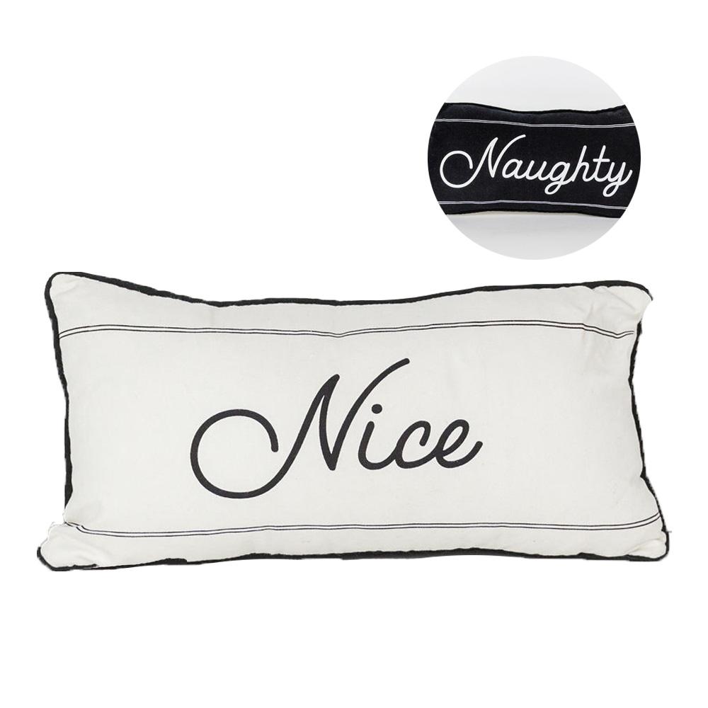 A reversible Naughty or Nice pillow featuring black and white colors, displaying 'Naughty' on one side and 'Nice' on the other, perfect for Christmas decor.