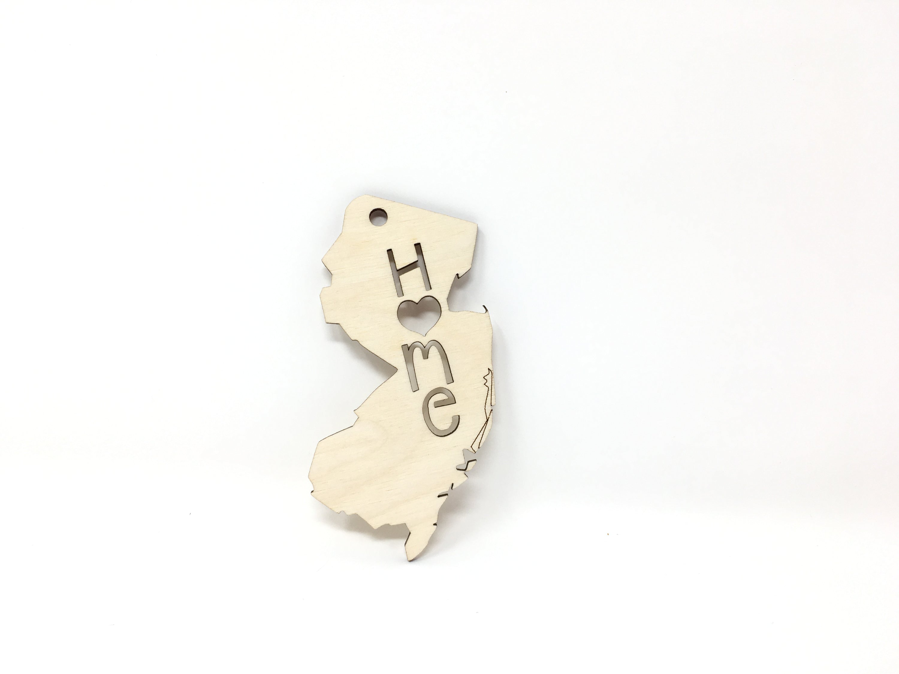 New Jersey State Wood Christmas Ornament featuring a 'Home' design, crafted from premium Baltic Birch wood.