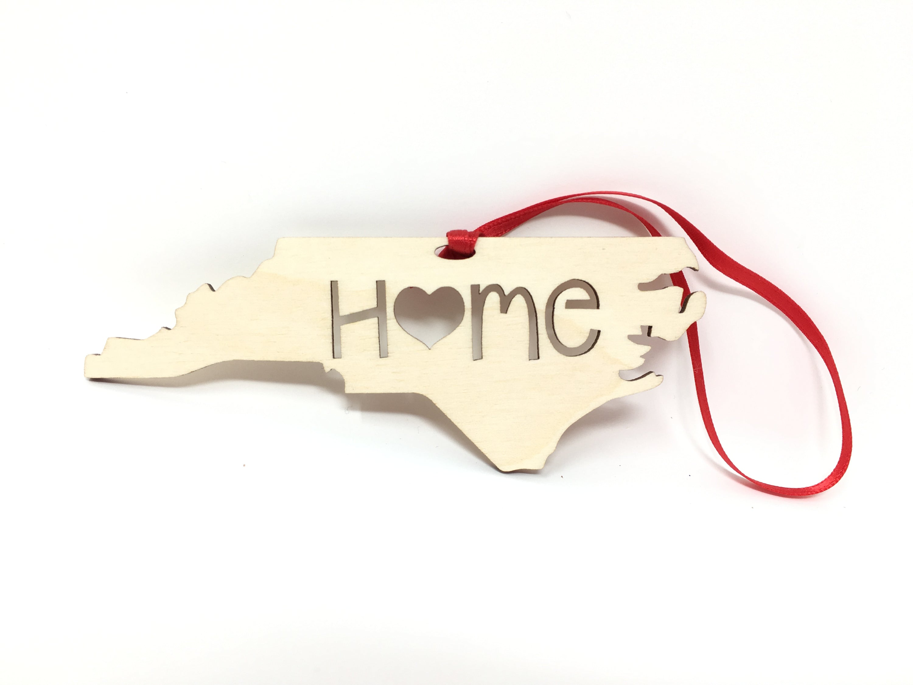 North Carolina State Wood Christmas Ornament made of Baltic Birch, featuring the word 'Home', beautifully packaged in a jewelry box.