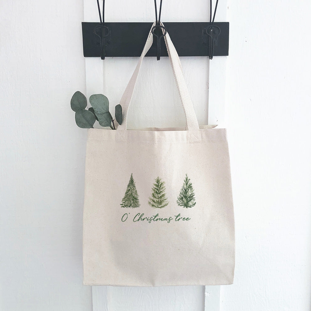 O' Christmas Tree Canvas Tote Bag featuring a vibrant holiday design, made from durable 12 oz. canvas with reinforced webbing straps.