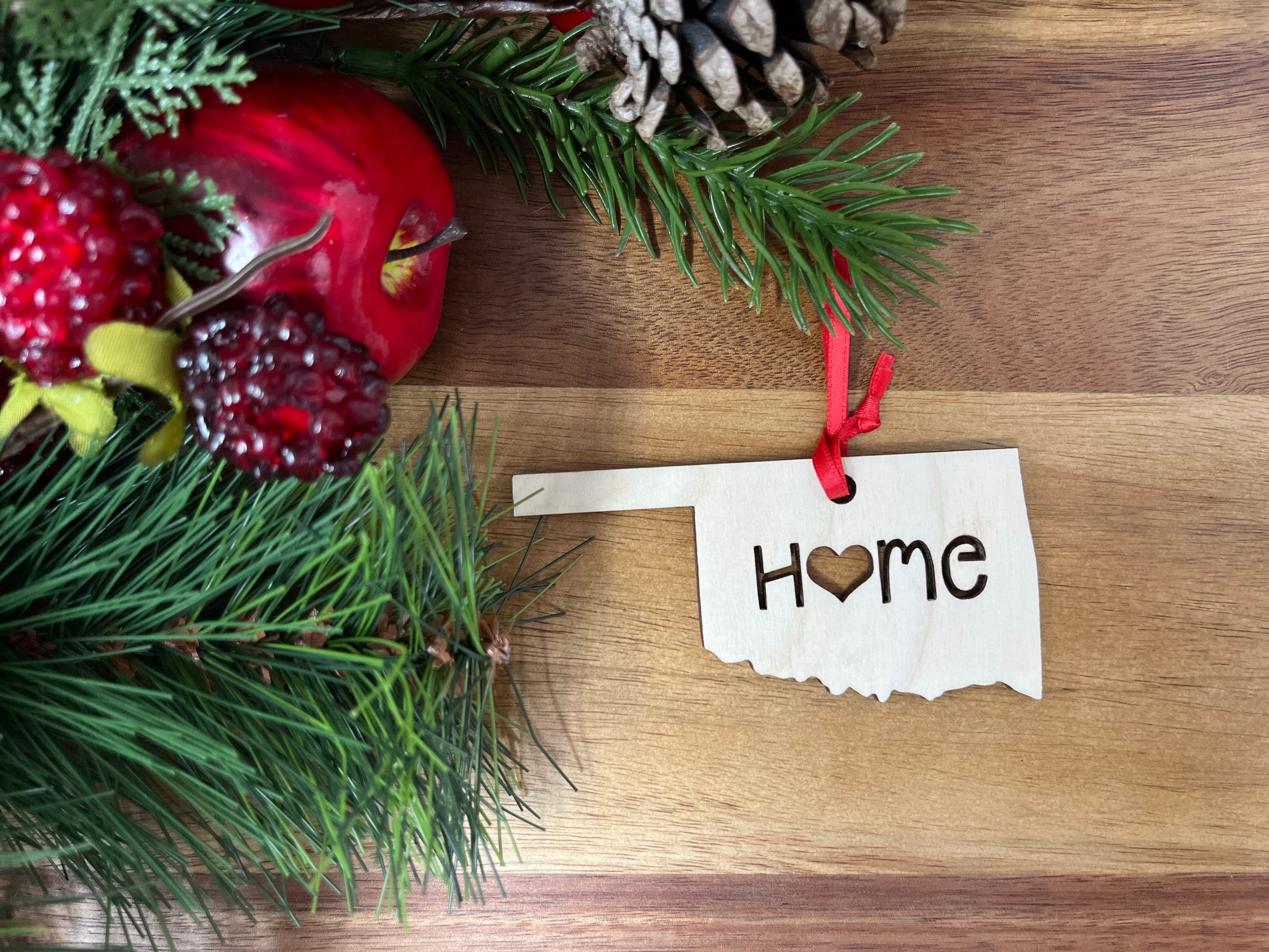 Oklahoma State Wood Christmas Ornament featuring a 'Home' design made from premium Baltic Birch wood.