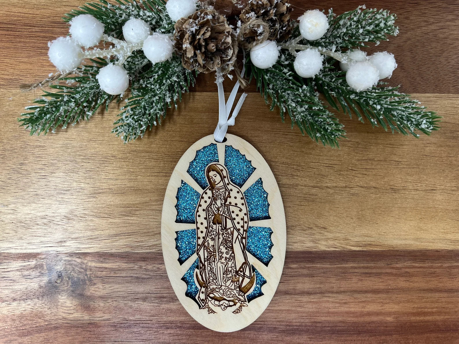 Our Lady of Guadalupe ornament made from premium Baltic Birch wood, intricately laser cut and assembled, perfect for holiday decoration.