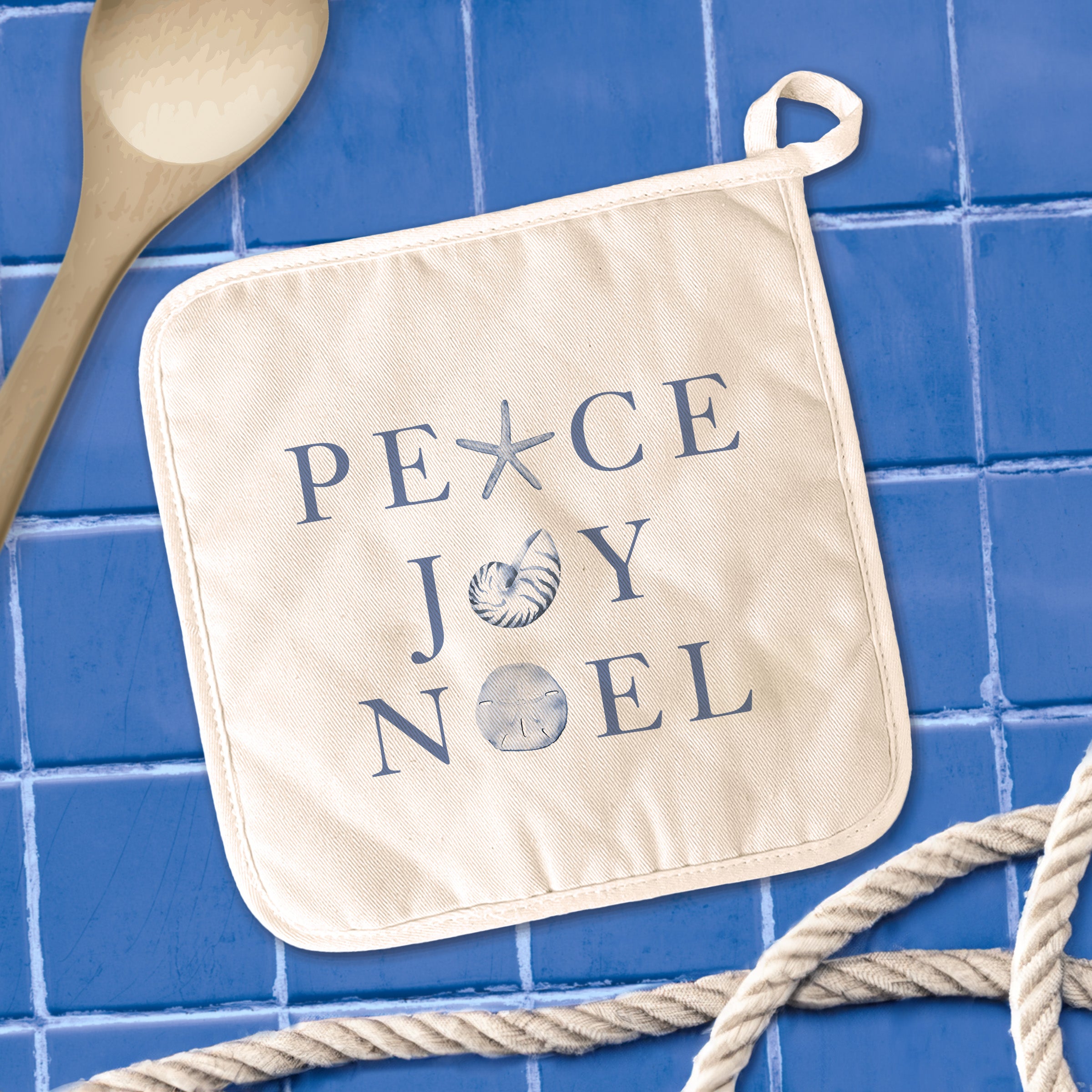 Peace Joy Noel Cotton Pot Holder featuring vibrant designs and a convenient hanging loop, perfect for protecting surfaces from hot cookware.