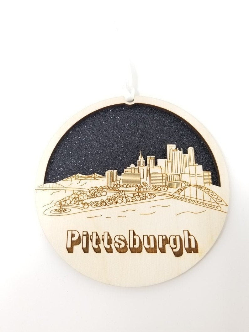 Pittsburgh skyline ornament made from premium Baltic birch wood, showcasing intricate city skyline design.