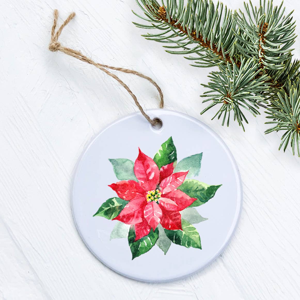 A beautifully crafted porcelain Poinsettia ornament featuring vibrant colors and intricate designs, perfect for holiday decor.