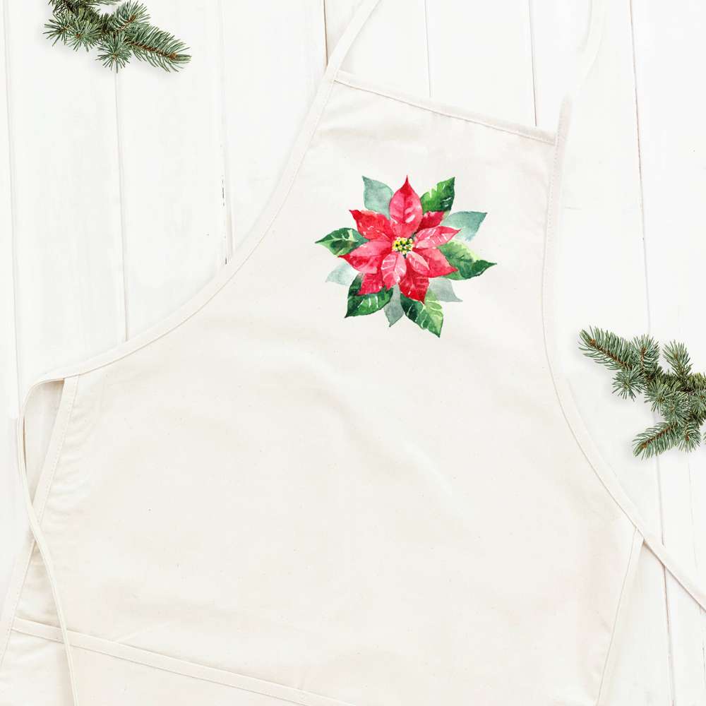 Poinsettia Women's Apron featuring elegant design, adjustable neck, and divided front pocket, made from durable cotton canvas.