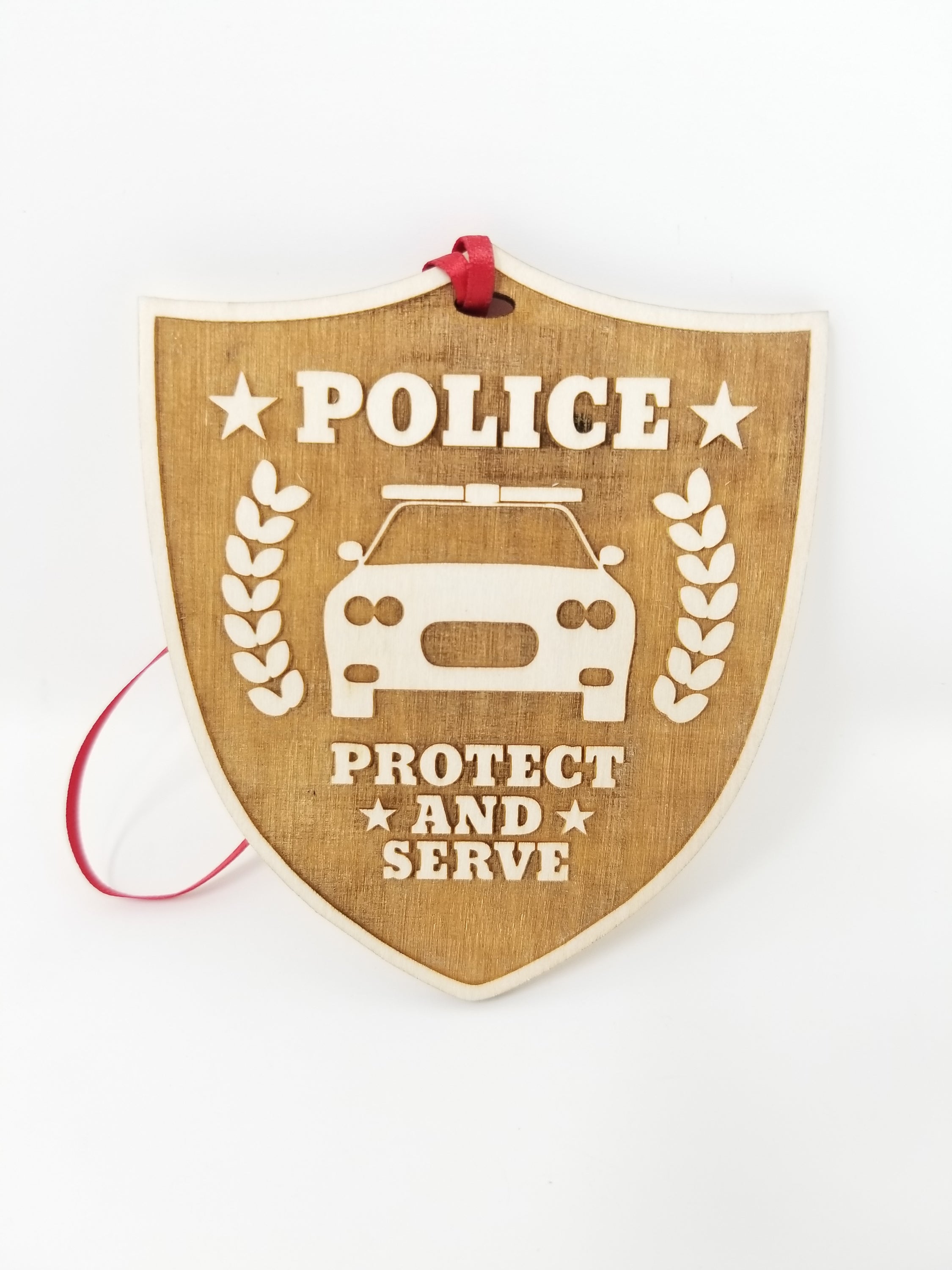 A beautifully crafted wooden Police ornament, approximately 4 inches in diameter, featuring intricate designs honoring first responders.