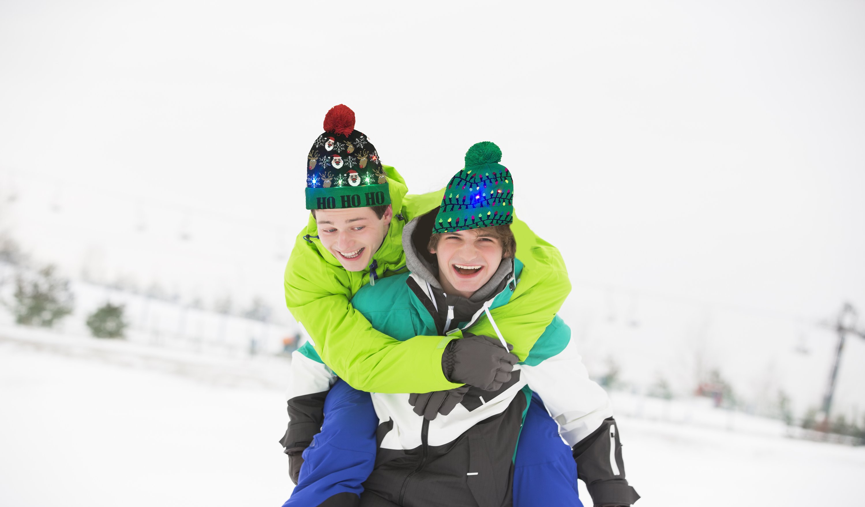 Colorful Pom Pom Party Holiday Hats with LED lights, featuring festive designs like snowmen and Christmas trees, perfect for holiday celebrations.