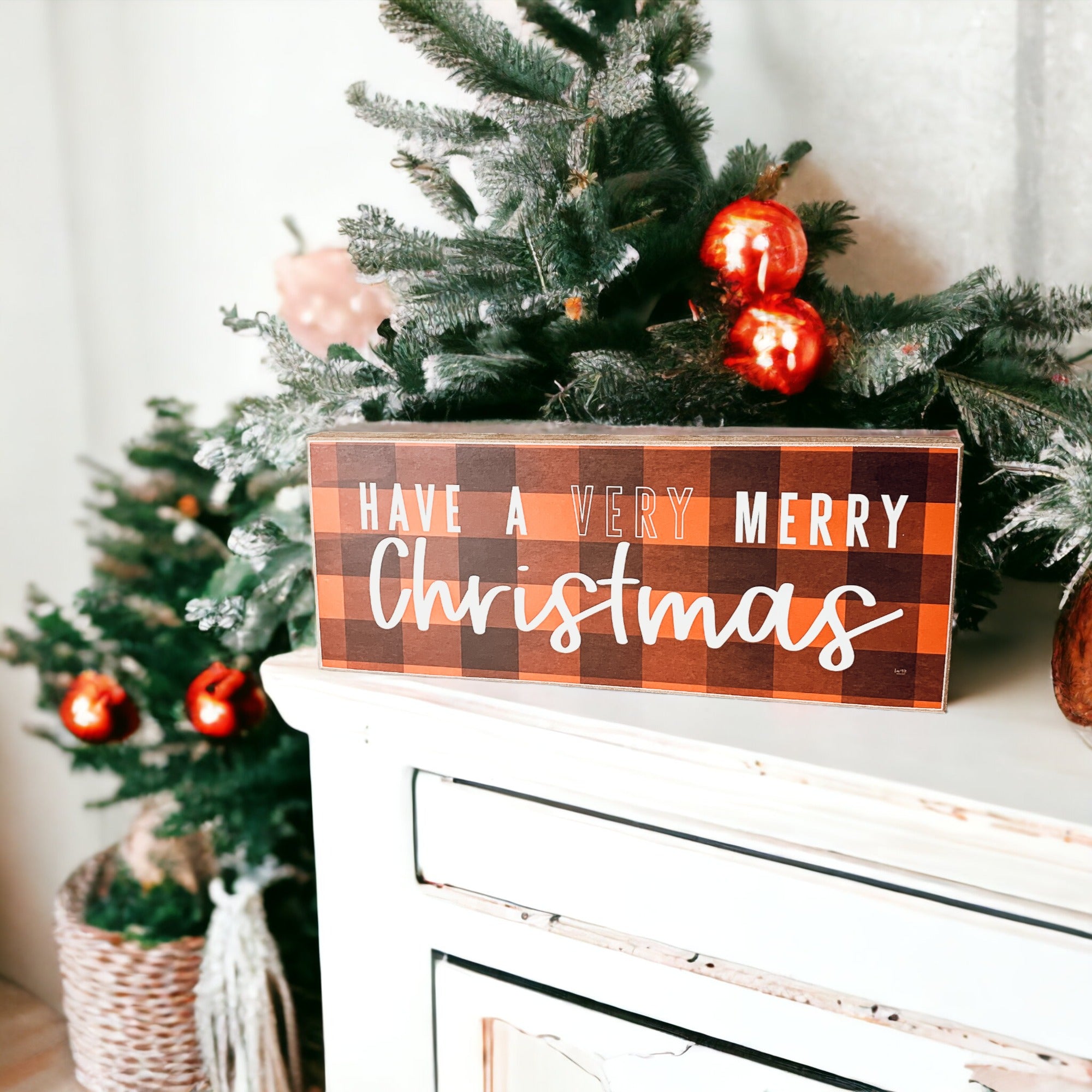 A festive Red Buffalo Christmas Sign made of thick wood, featuring a classic gingham pattern, perfect for holiday decor.