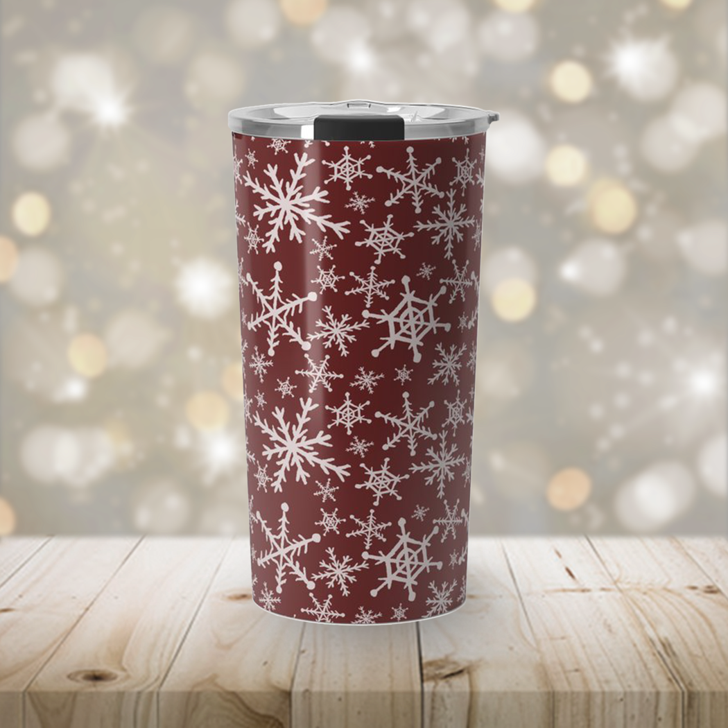 Red Snowflakes Travel Coffee Mug made of stainless steel with a beautiful snowflake design, perfect for hot or cold beverages.